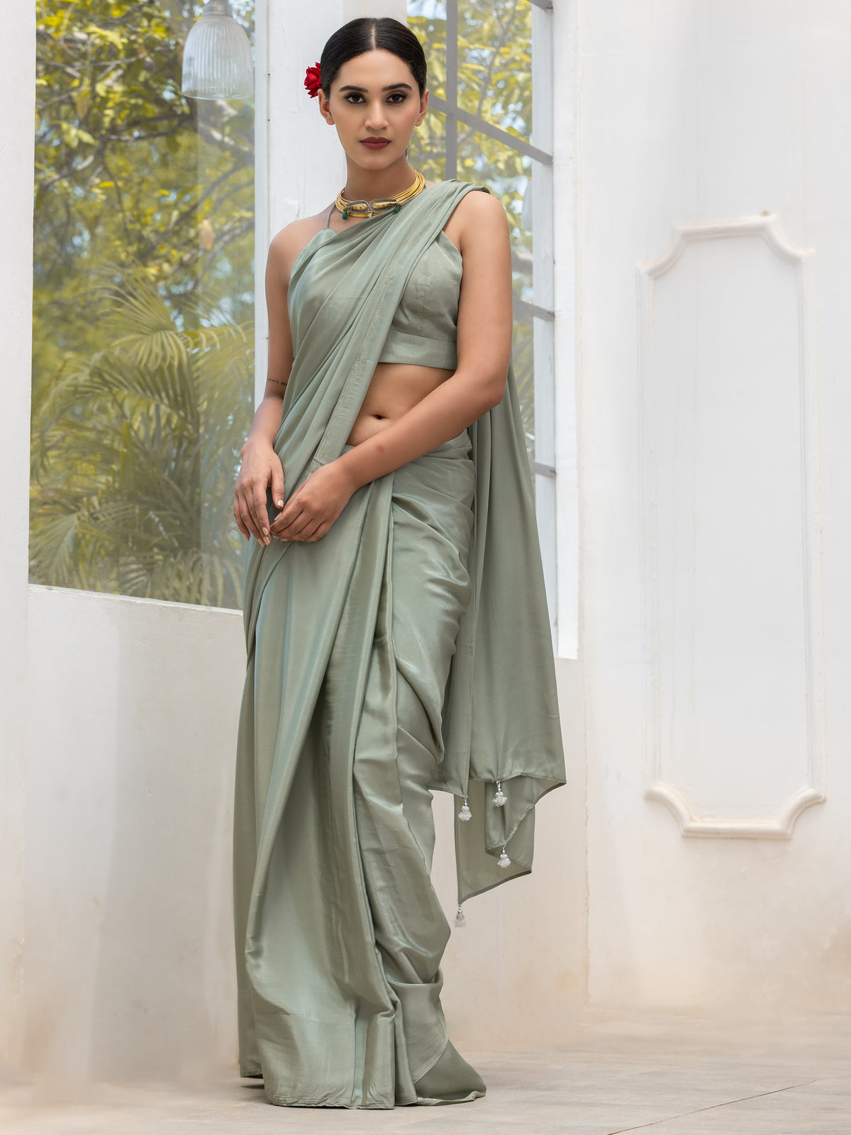 Sage crepe saree with silver pendants and blouse fabric