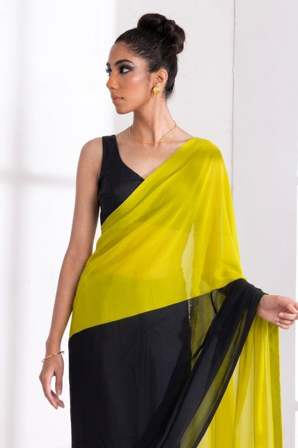 Black and Yellow Georgette Triangle Saree with Blouse Fabric