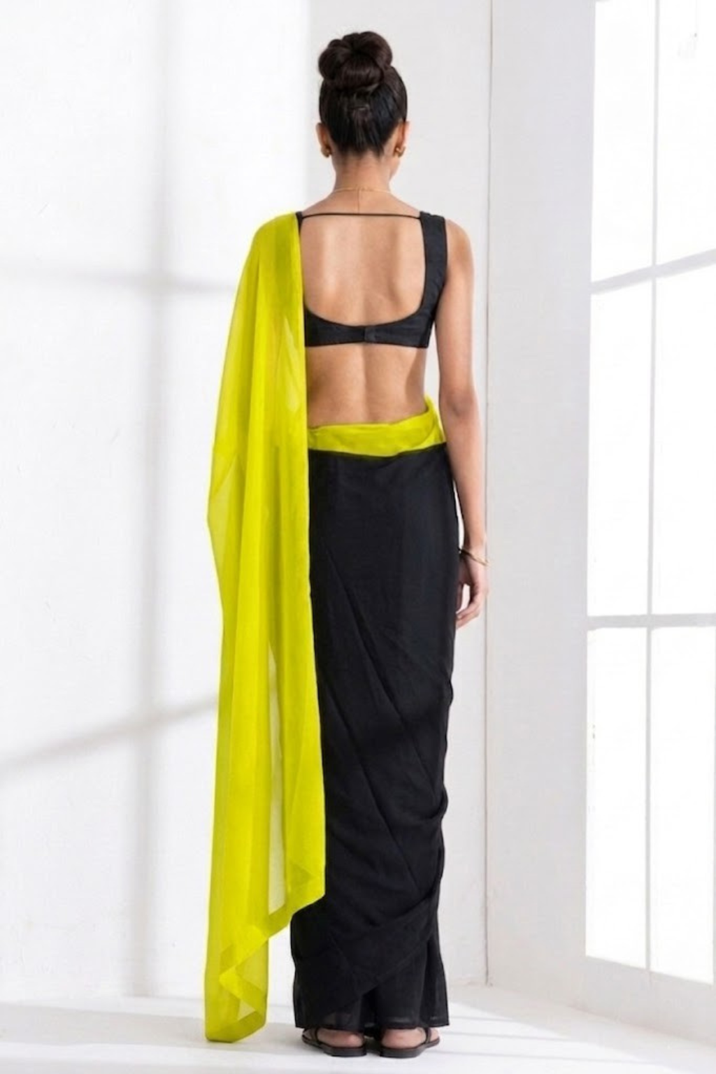 Black and Yellow Georgette Triangle Saree with Blouse Fabric