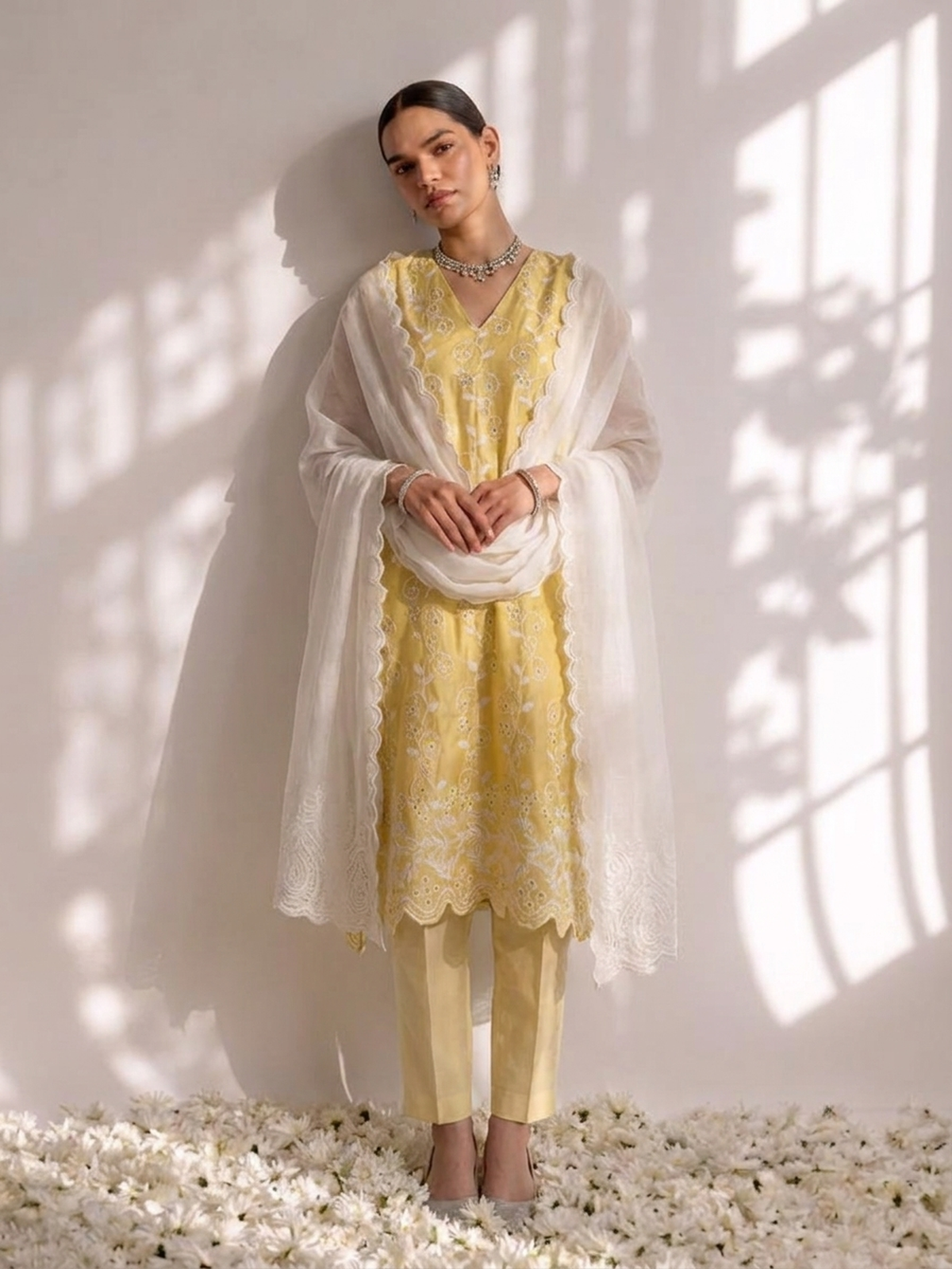Sunshine yellow cotton allover embroidered Schiffli sleeveless kurta with pants