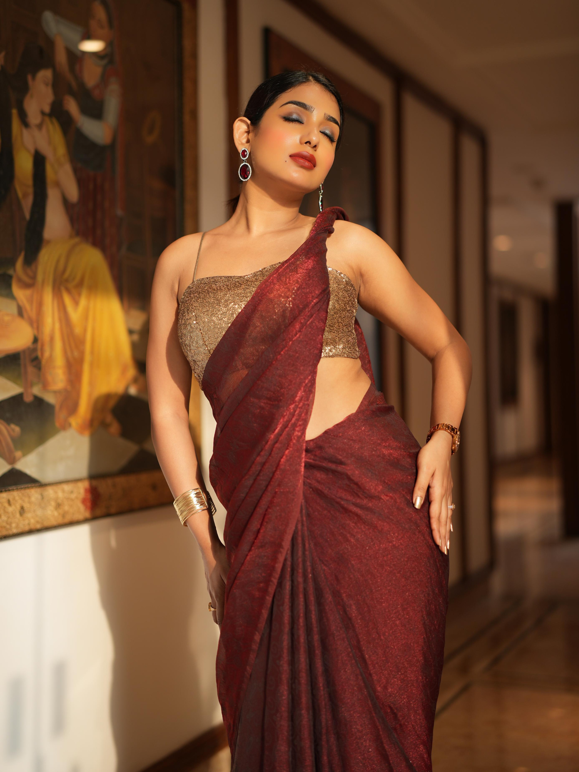 Majestic Maroon Paisley Chiffon Saree with Bronze Long Pendants with Blouse Fabric