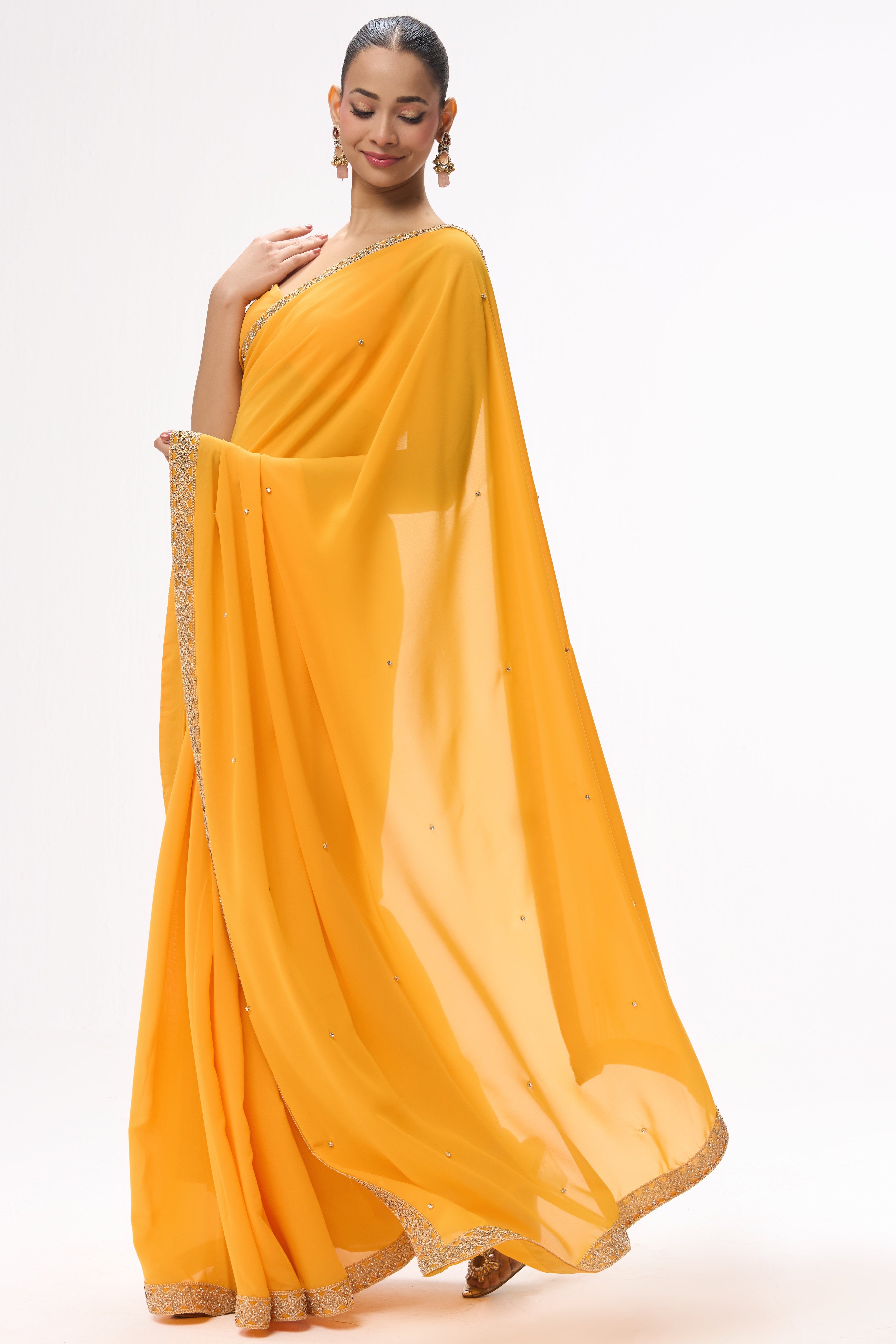 Turmeric Yellow Drapy Georgette Saree with Diamonds and Self Blouse Fabric