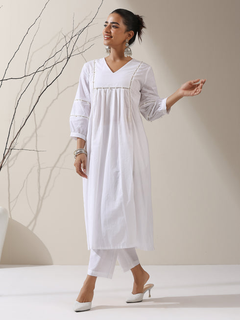 2-Piece White Cotton Bib Kurta Set for Women – Pearl Embellished Detailing with Matching Pants | Elegant Ethnic Co-ord