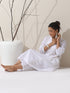 2-Piece White Cotton Bib Kurta Set for Women – Pearl Embellished Detailing with Matching Pants | Elegant Ethnic Co-ord