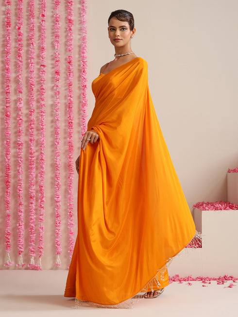 Foxy Orange Crepe Saree with Lace Drops