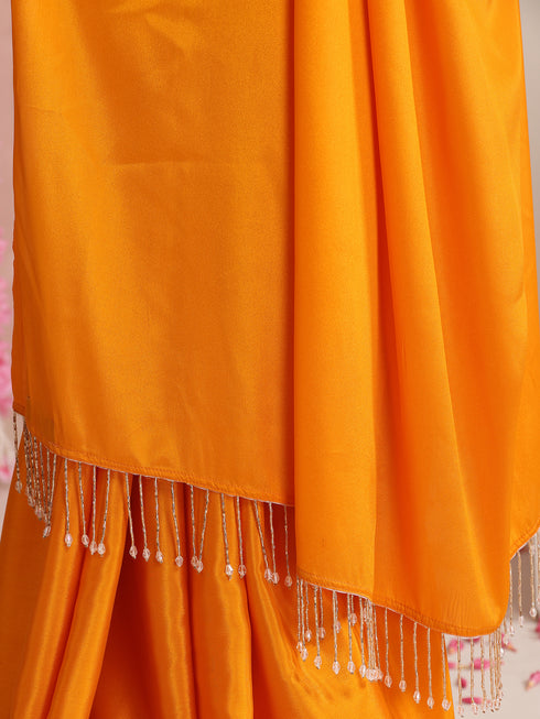 Foxy Orange Crepe Saree with Lace Drops