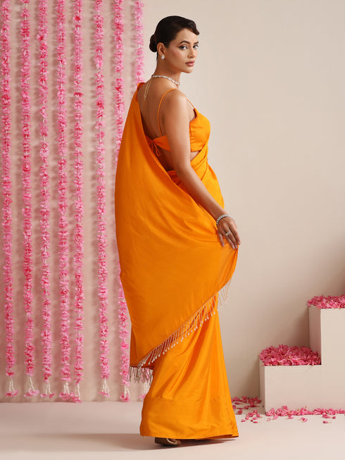 Foxy Orange Crepe Saree with Lace Drops