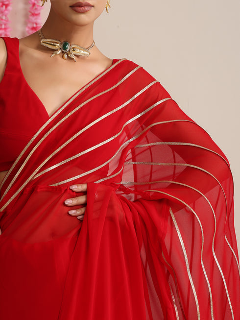 Red and Gold Triangle Impression Georgette Saree with Blouse Fabric
