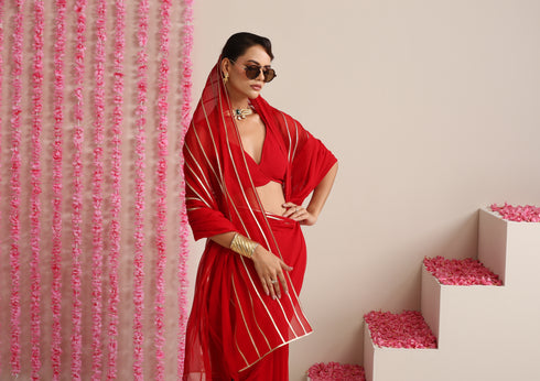 Red and Gold Triangle Impression Georgette Saree with Blouse Fabric