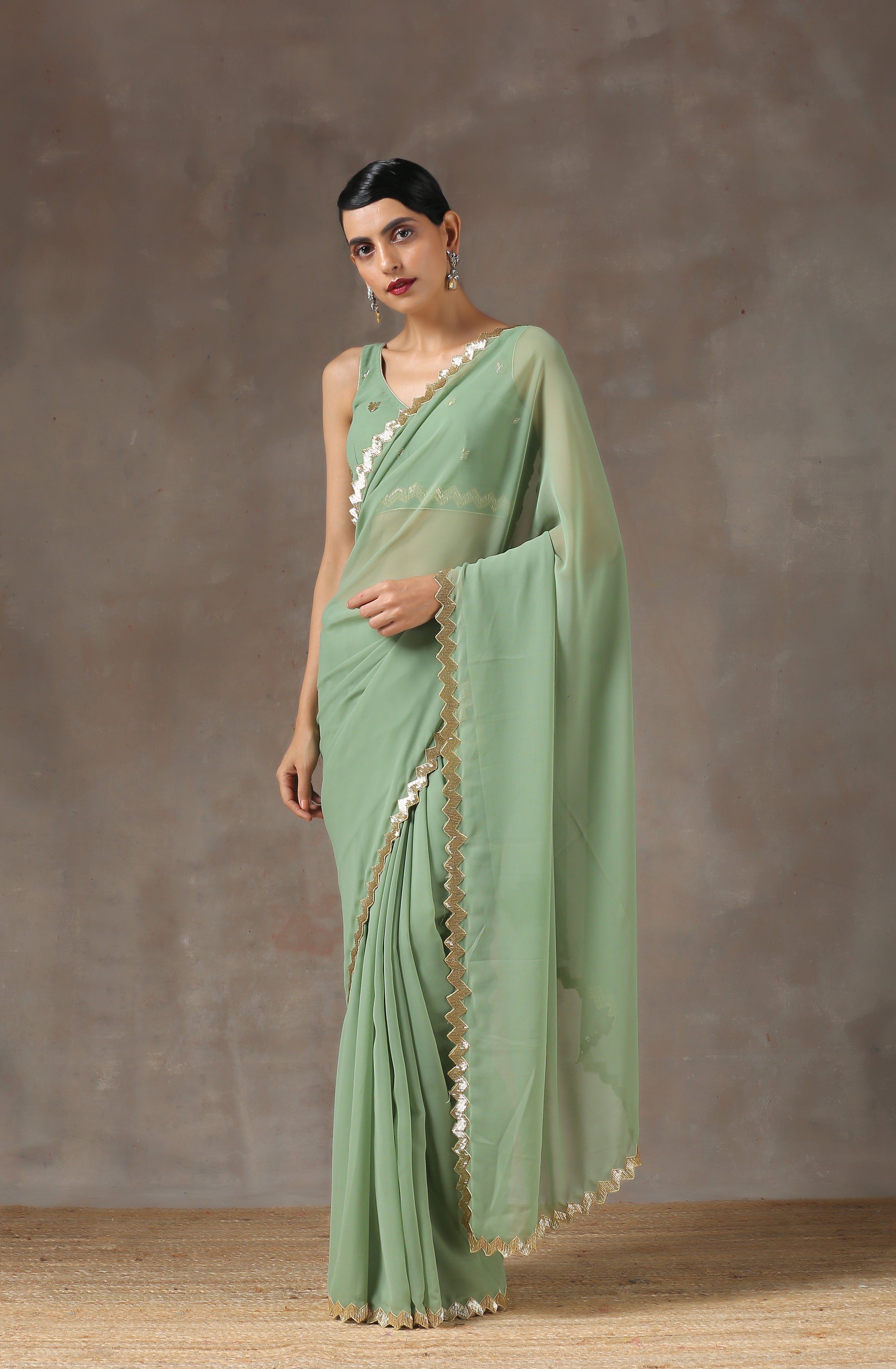Sparking Henna Saree with Gold Sequins & Embellished Blouse