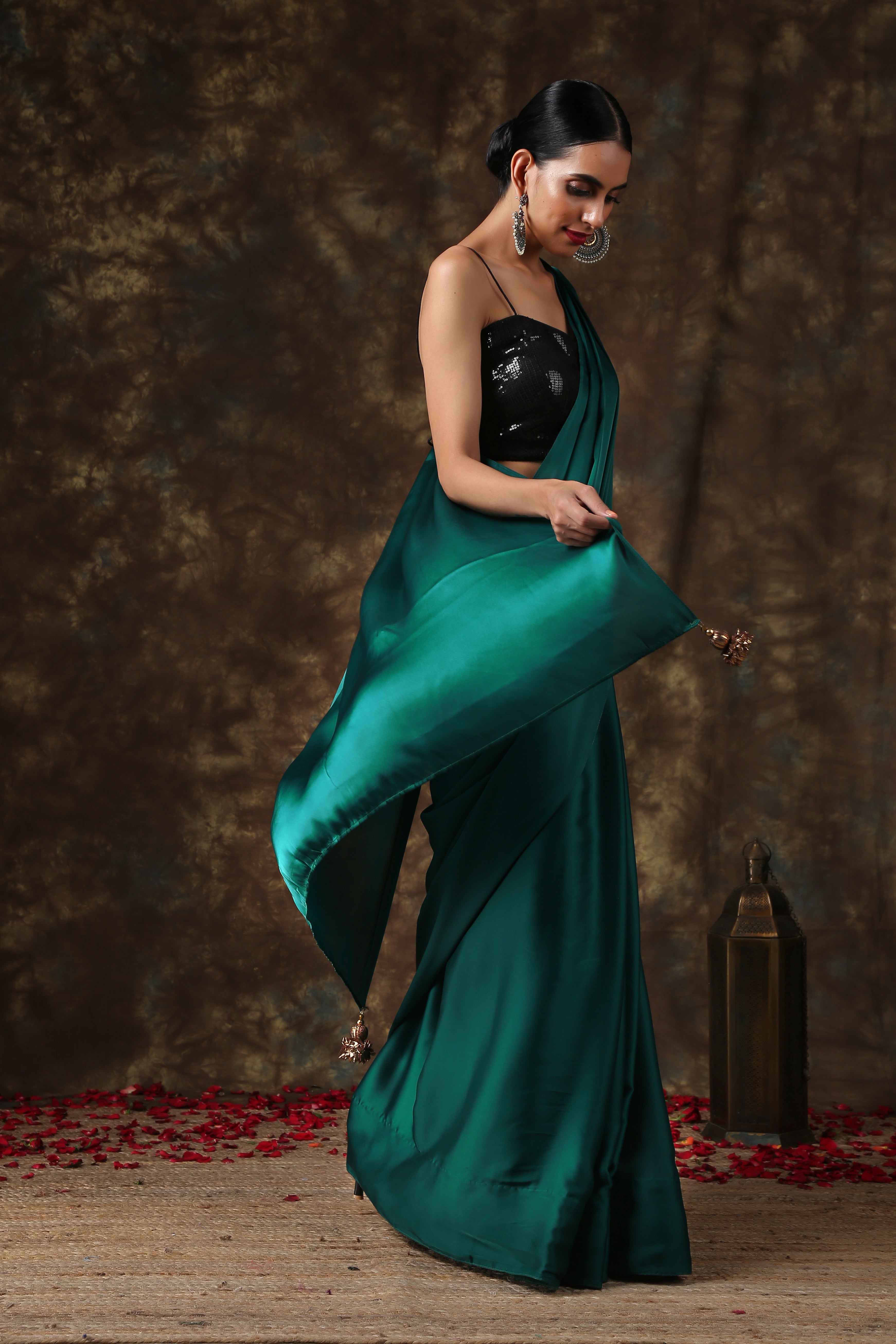 Rich Emerald Green Satin Saree with Bronze Pendants
