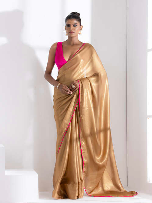 Hazel beige gold chiffon saree with pink edge lace and posh blouse fabric