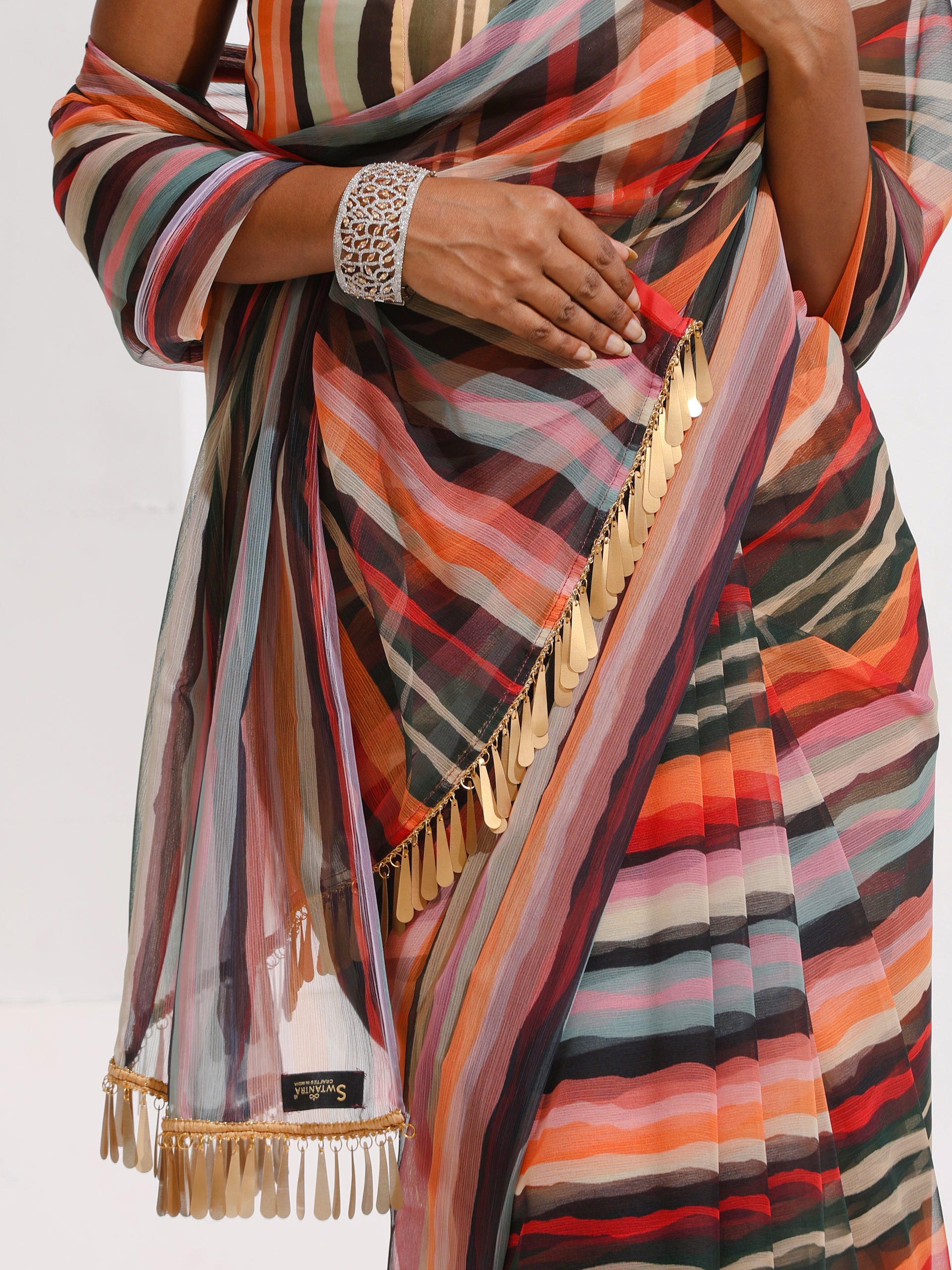 Metropolitan Chiffon Saree with Hanging Gold Lace and Self Blouse Fabric
