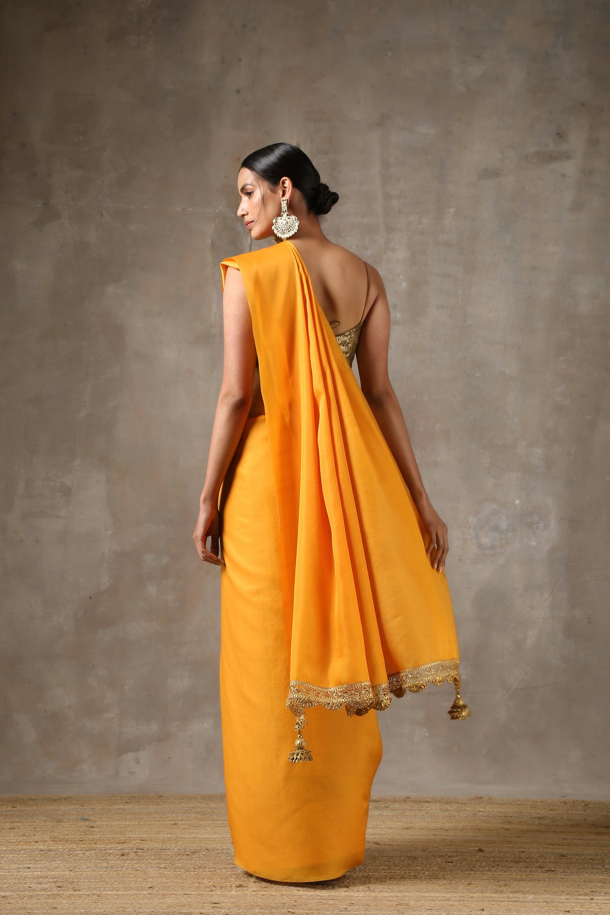 Ochre saree with handmade lace on edge with pendants — view 6