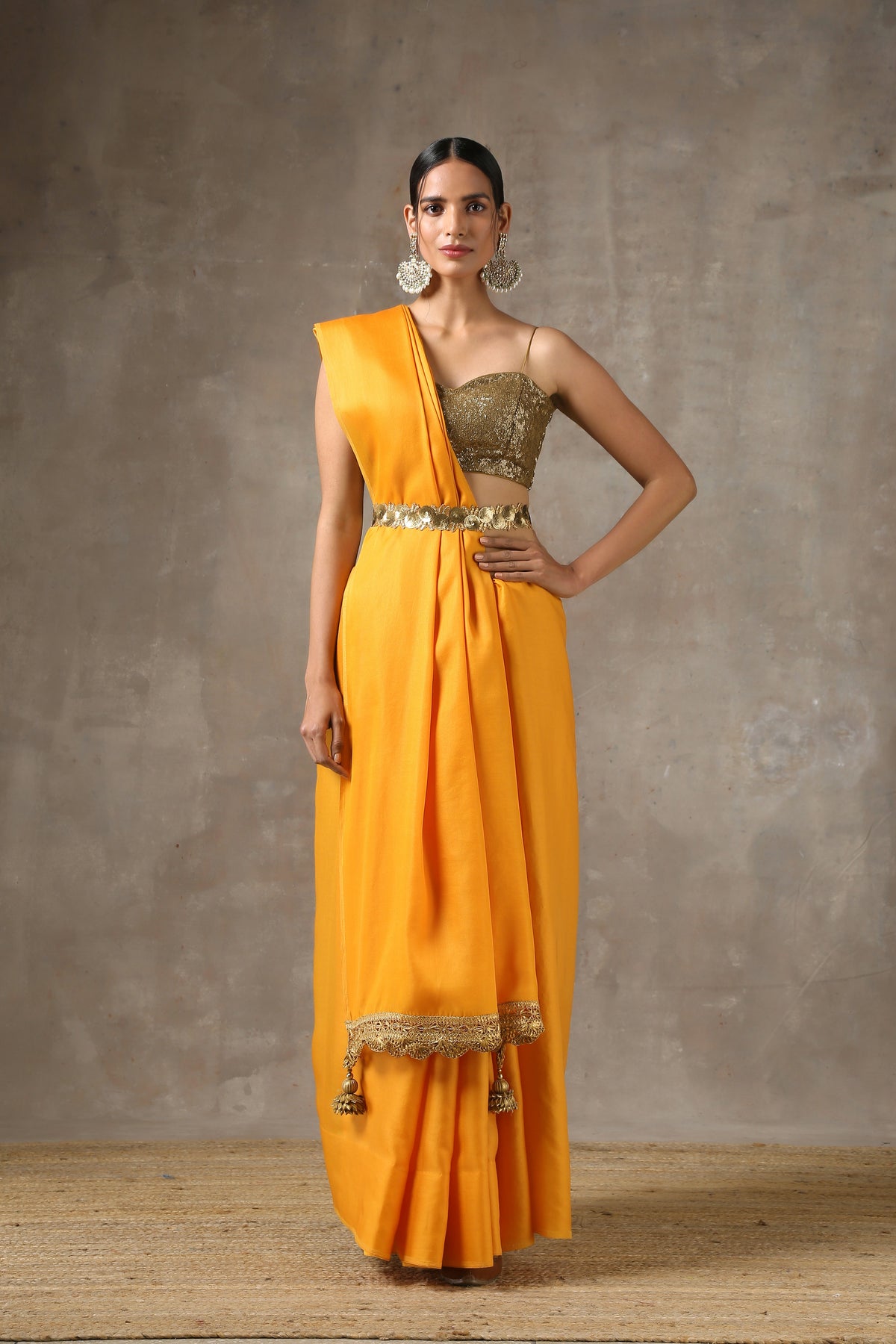 Ochre saree with handmade lace on edge with pendants