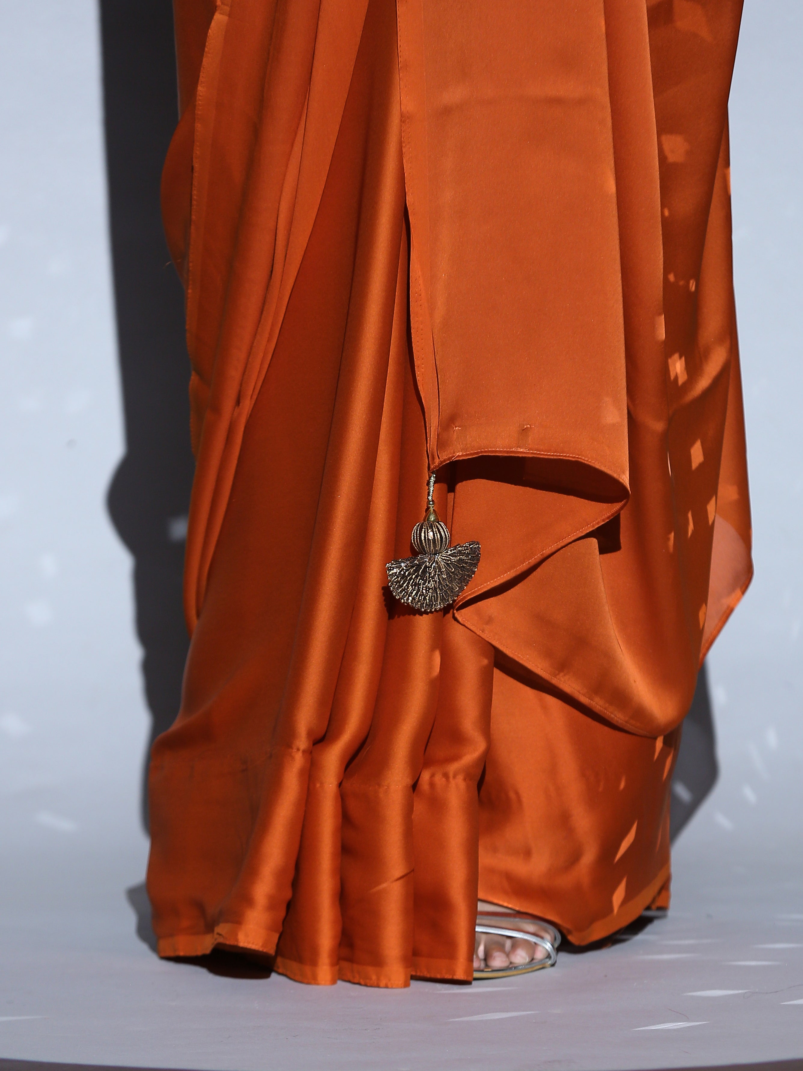 Pumpkin Spice Satin Saree with Pendants