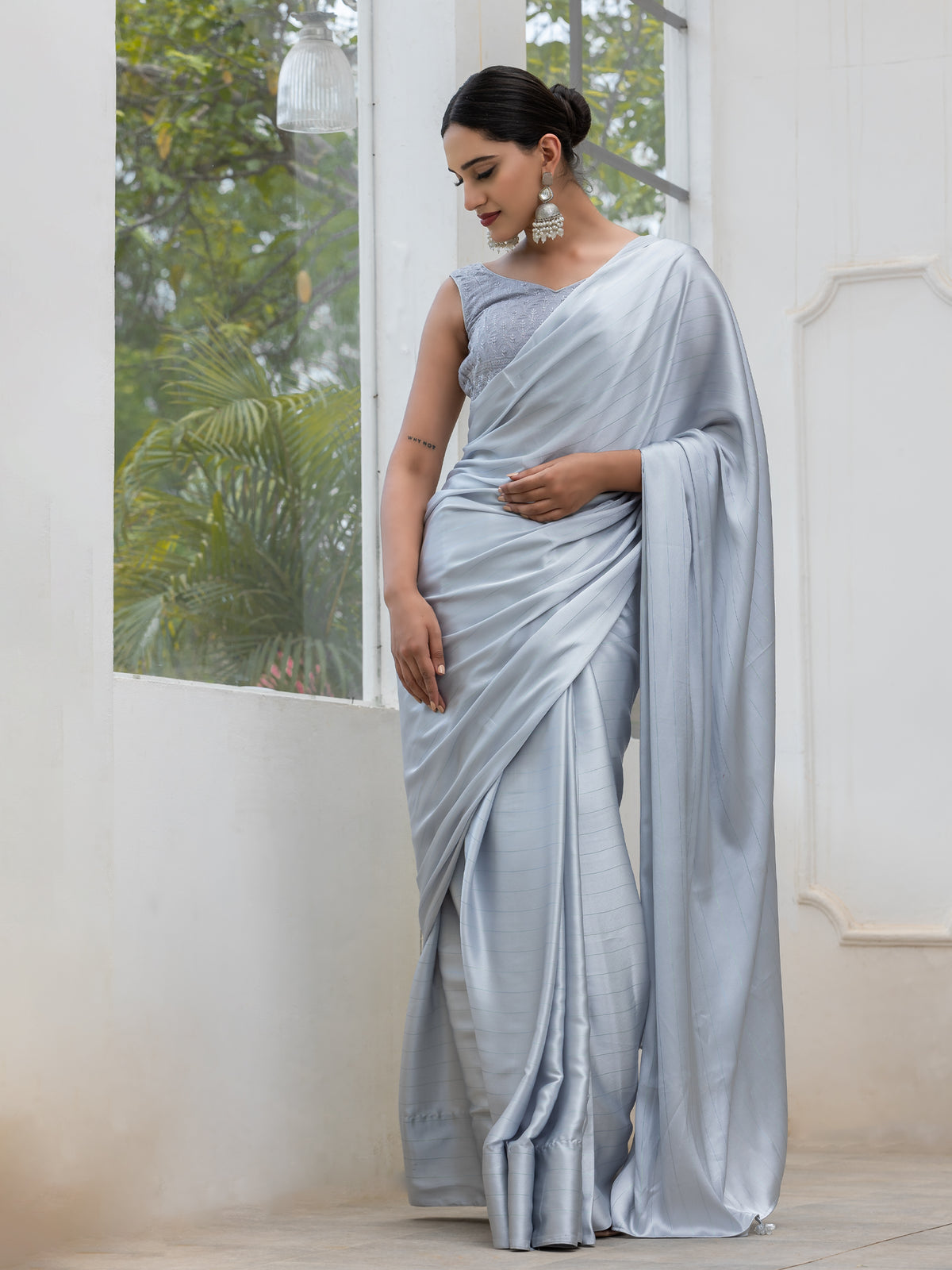 Ice grey stripe satin saree with embroidered blouse fabric