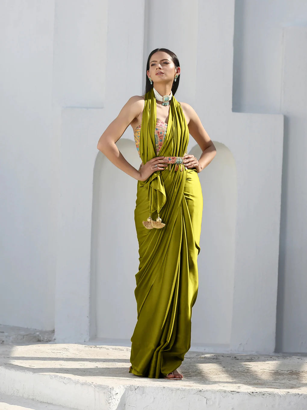 Lime satin saree with gold flat pendants