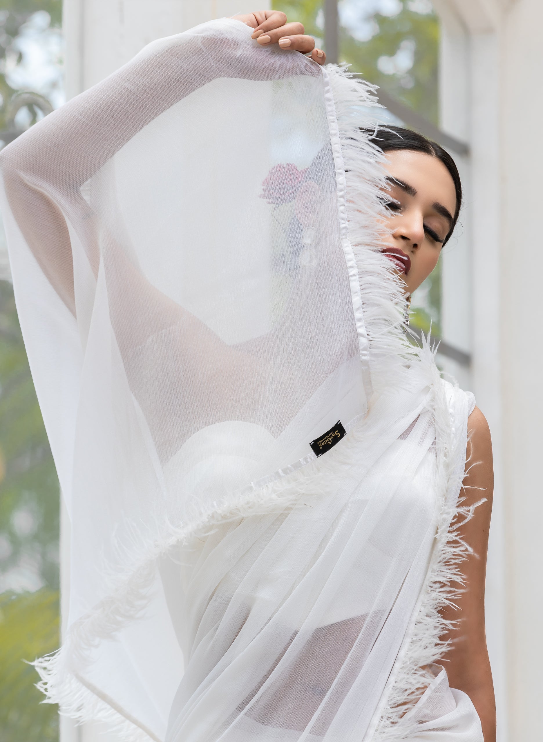 Gala Ready White Shimmer Saree with Faux Feathers and Blouse Fabric