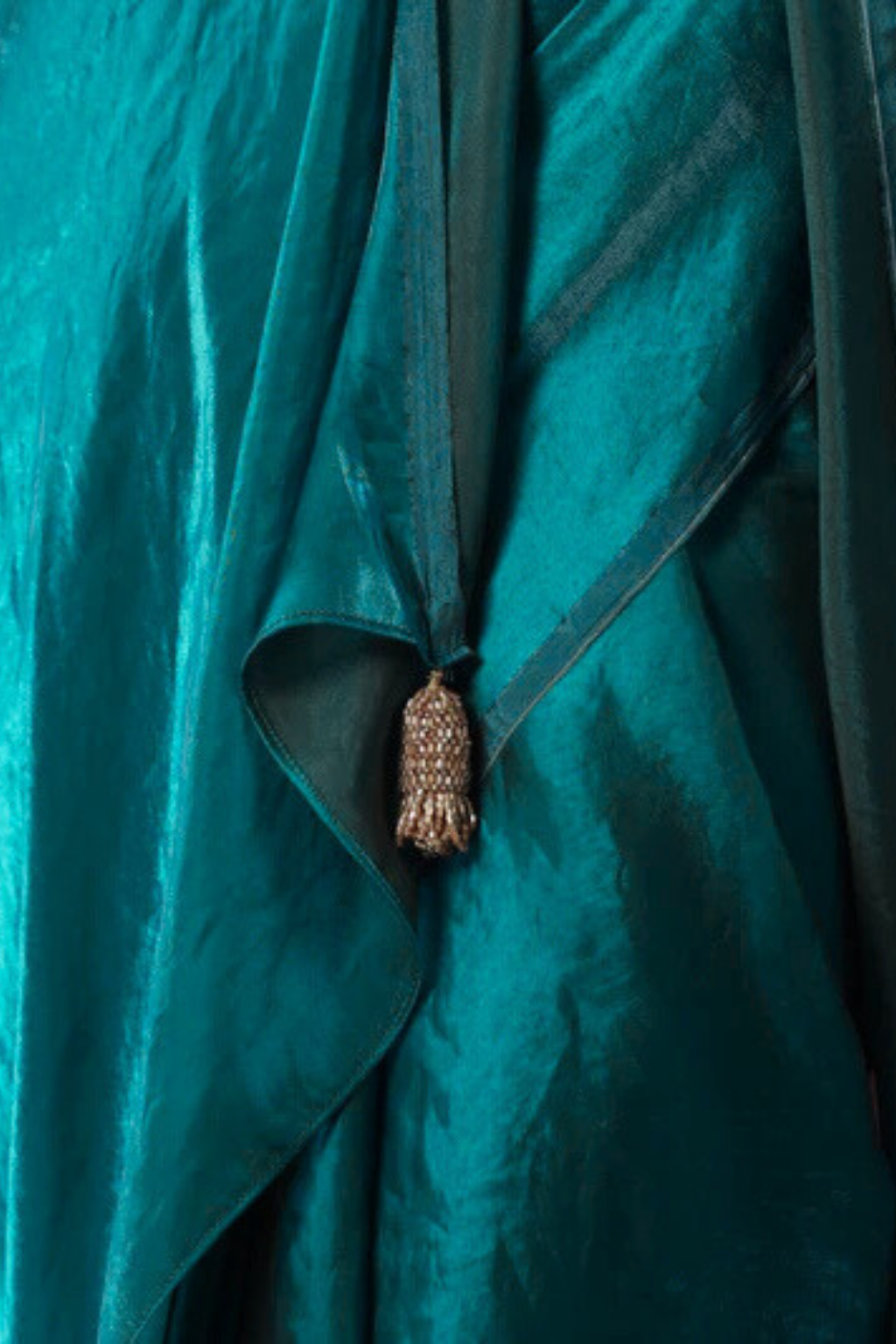 Green Metallic Satin Saree with Pendants and Blouse Fabric