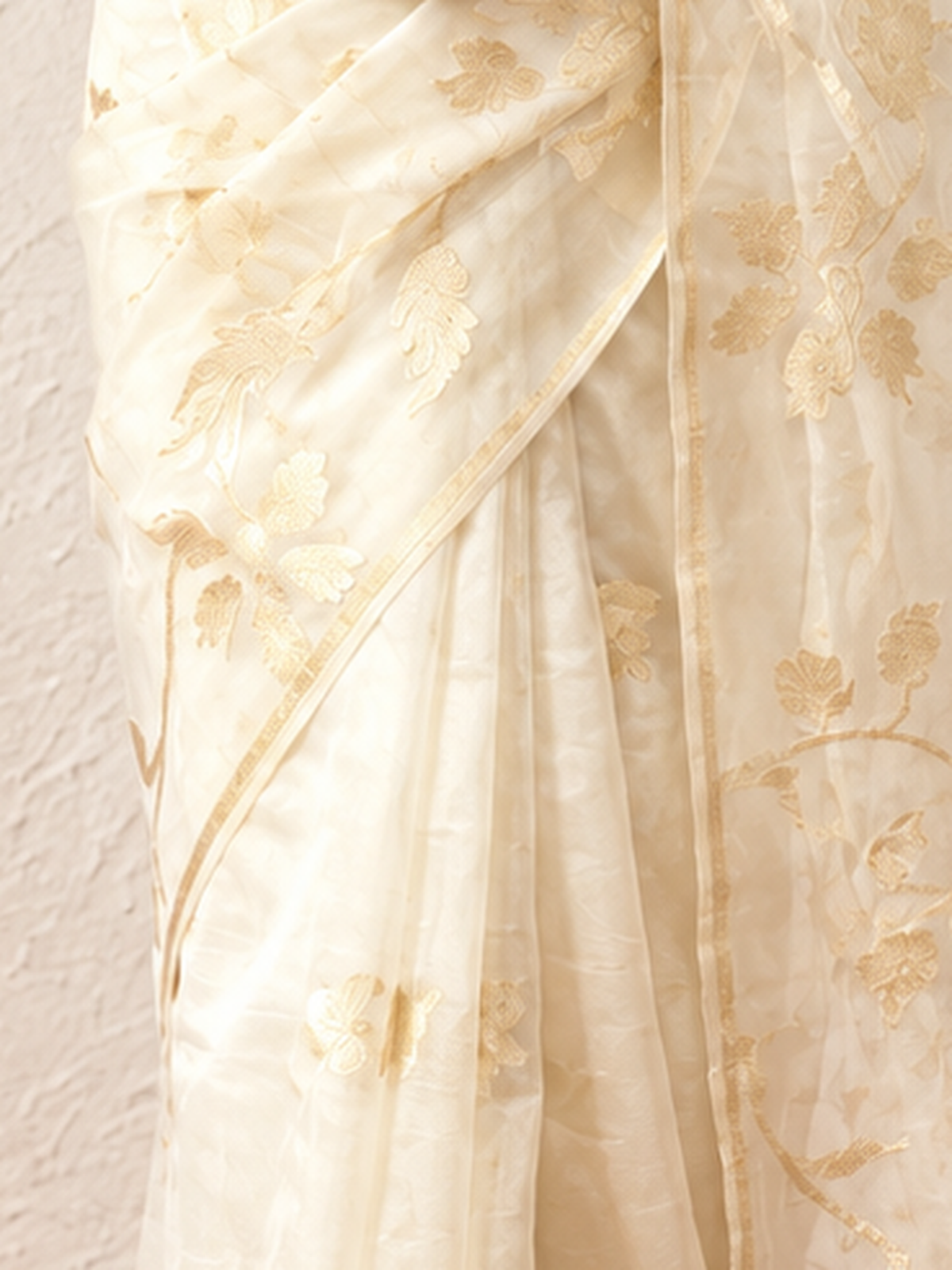Cream Organza Saree with Zari Buti and Matching Stripe Blouse Fabric