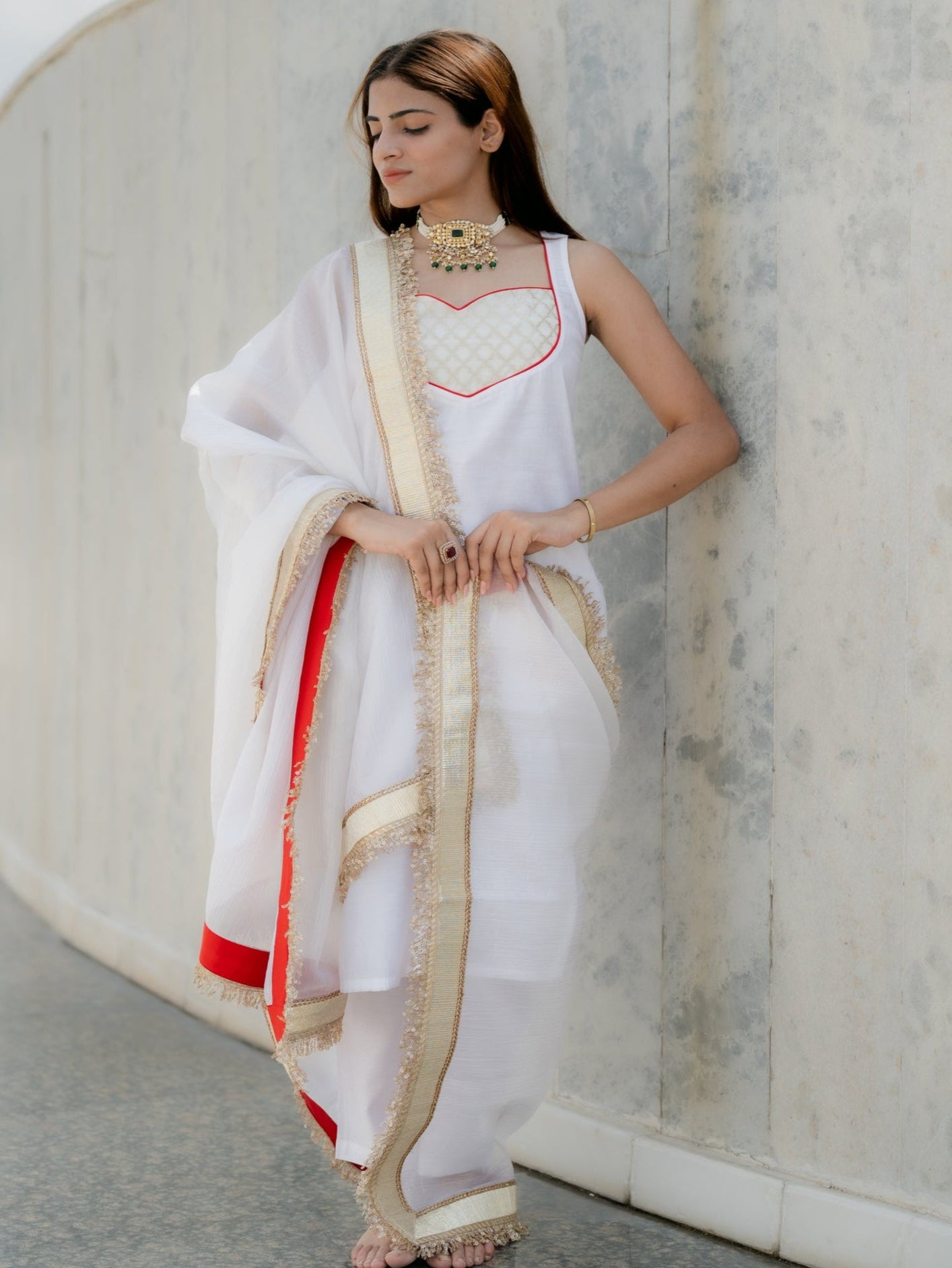3 Pc Suit Set - Airskin Shoe String Back Kurta with Gold Yoke and Red Piping, Pant and Laced Organza Golden Dupatta with Red backing