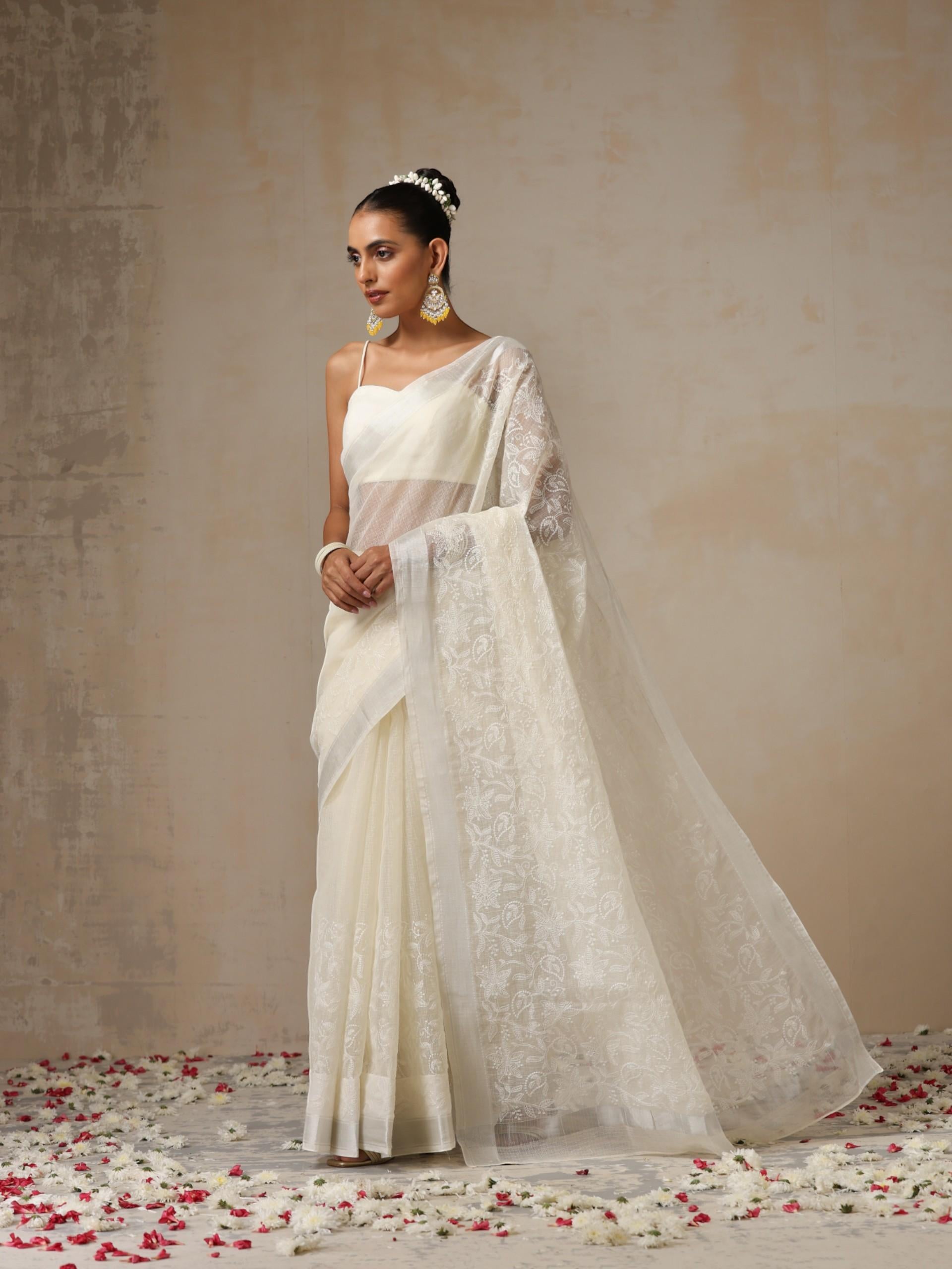 Cream and Silver Cotton Kota Saree with All over Embroidery and Blouse Fabric