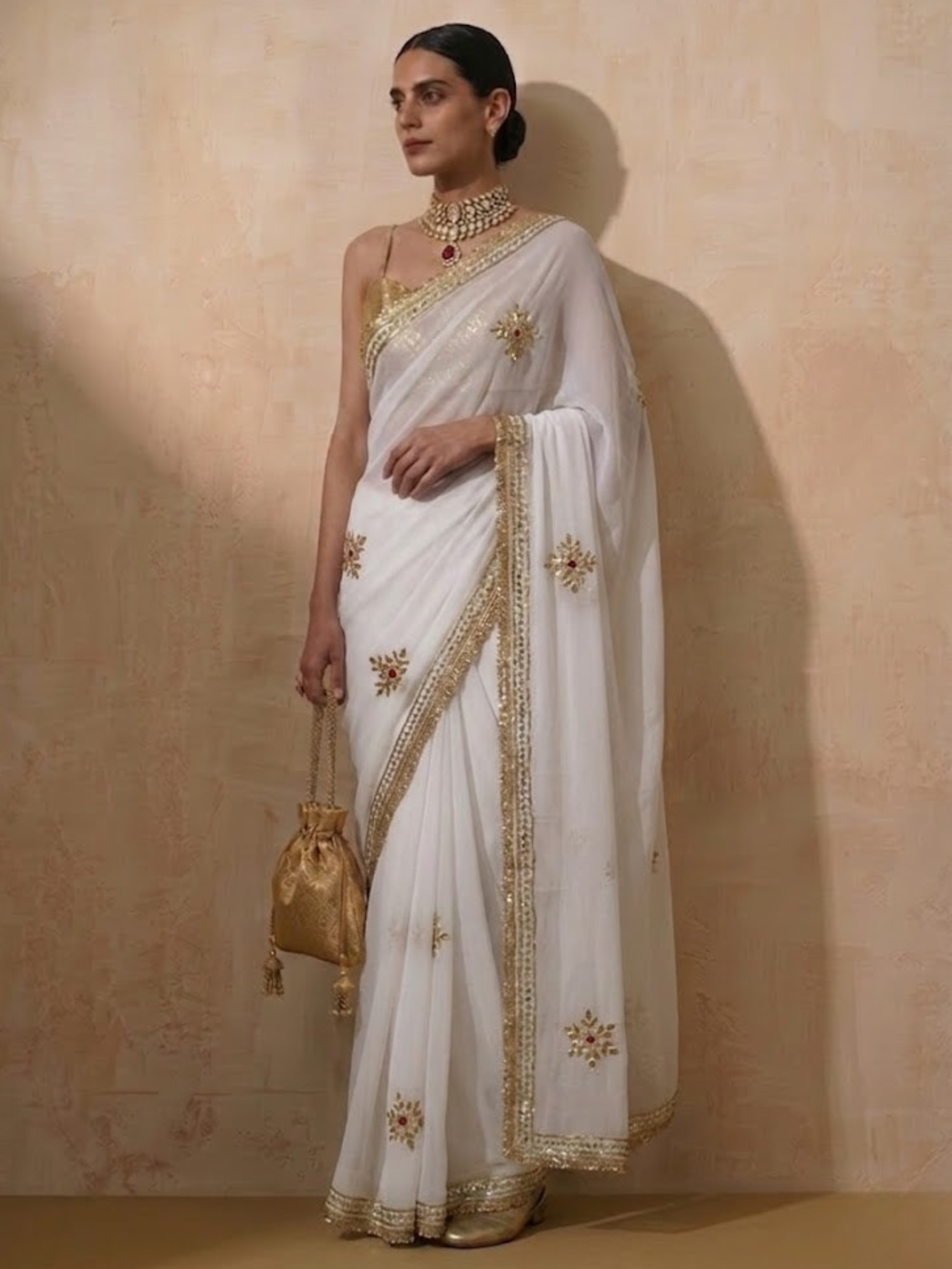 White chiffon saree with Gota patti handwork with self blouse fabric