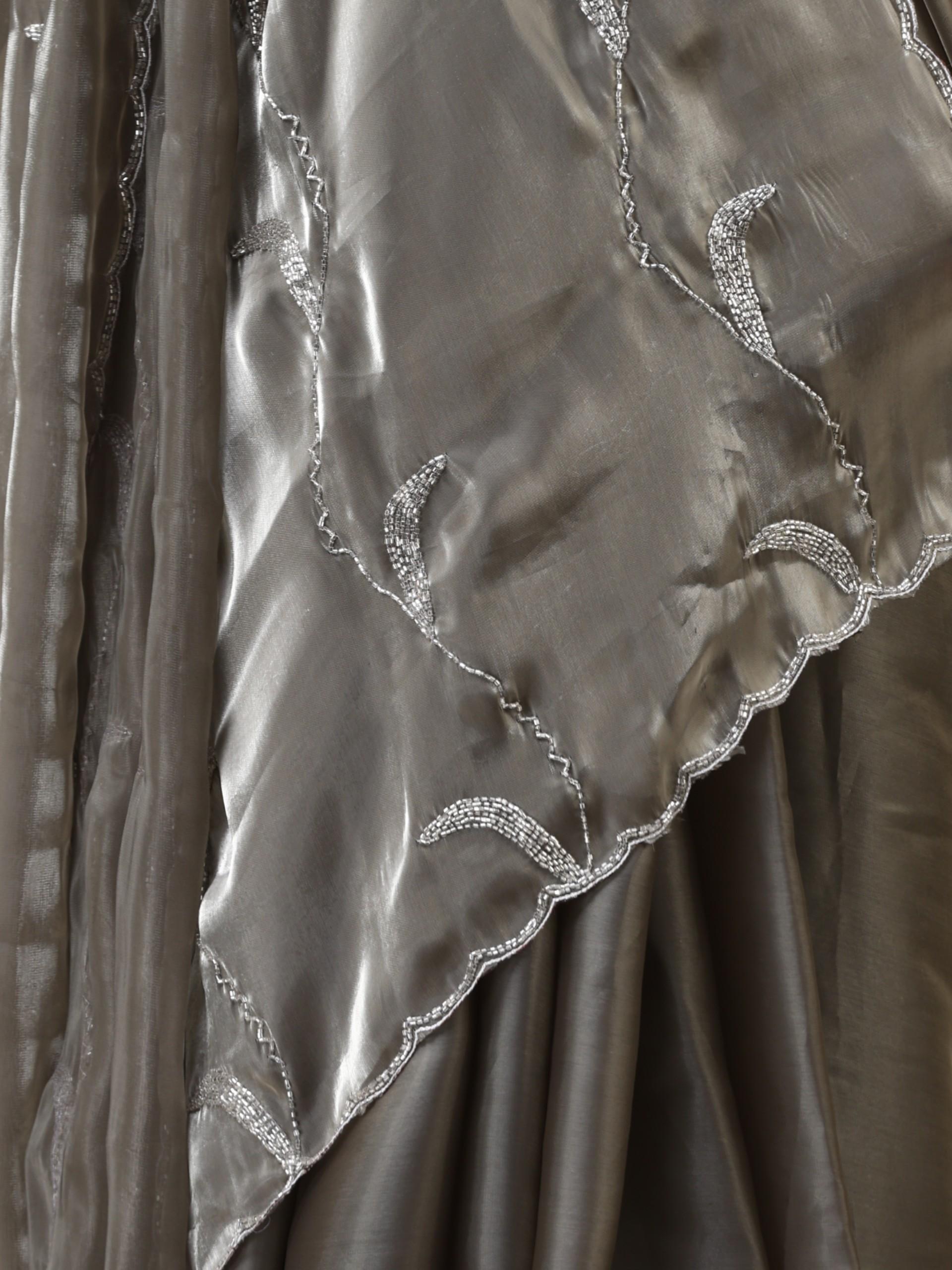 Liquid Gold Organza Saree with Hand Cut Dana Embroidery with Embroidered Blouse Fabric