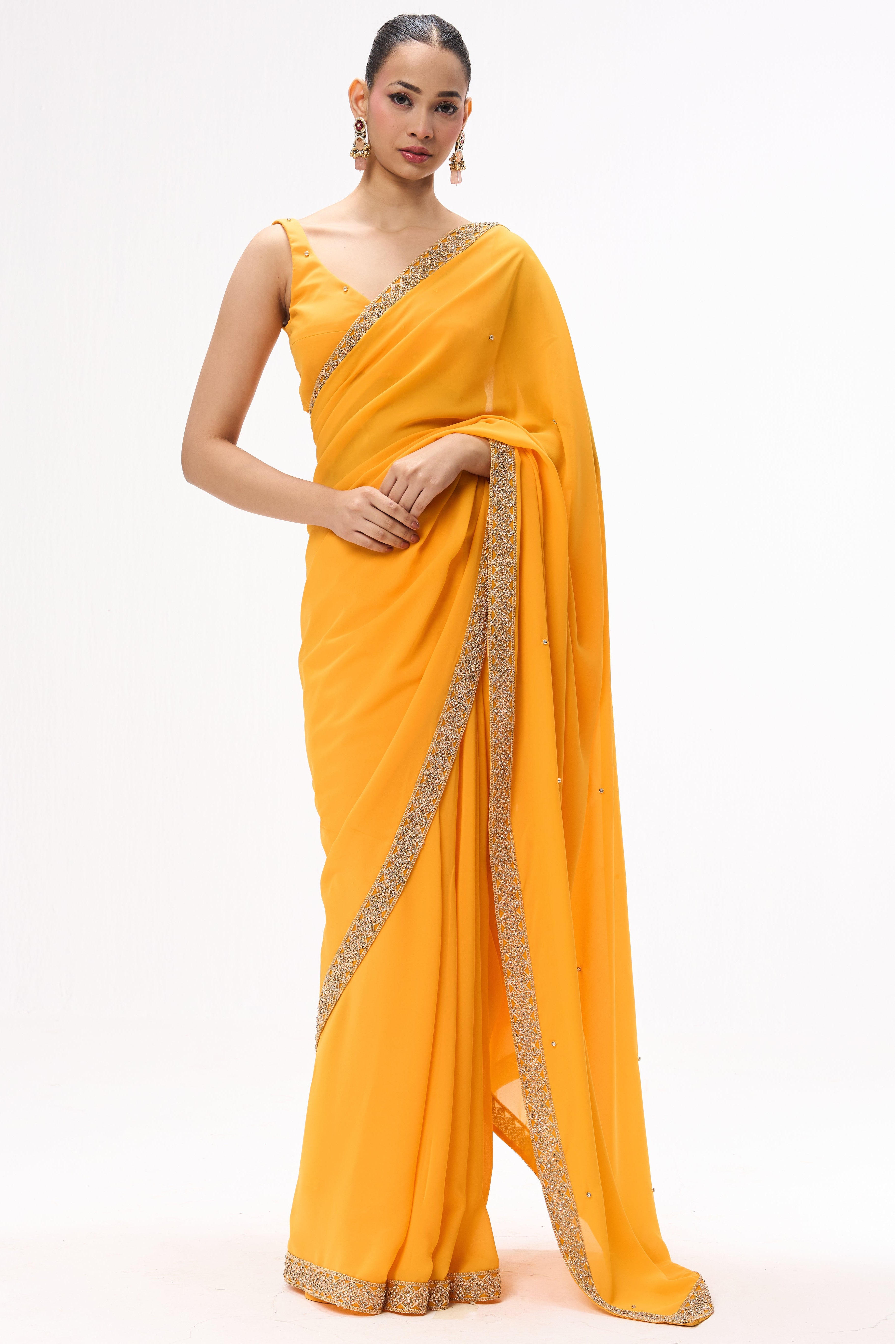 Turmeric Yellow Drapy Georgette Saree with Diamonds and Self Blouse Fabric