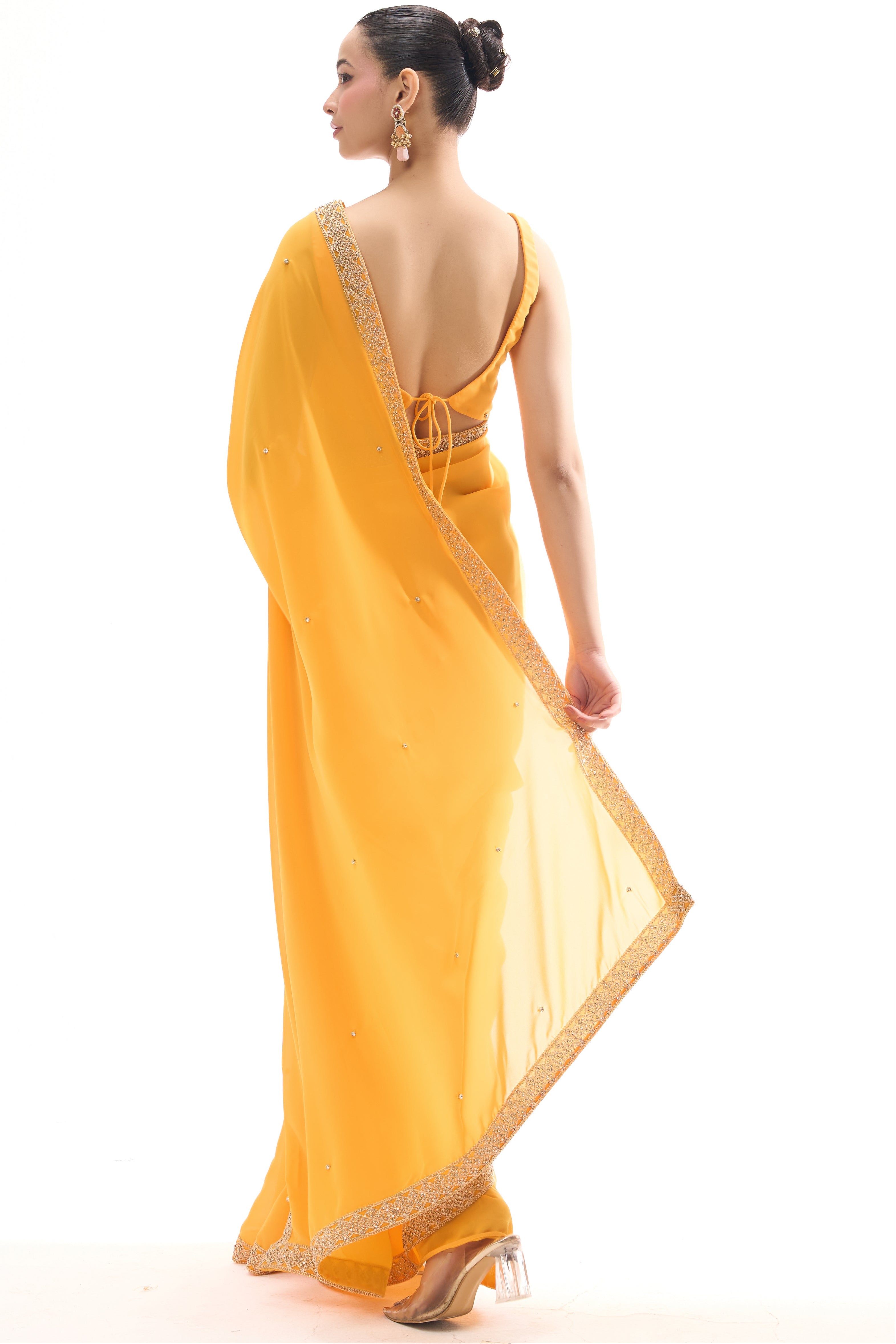 Turmeric Yellow Drapy Georgette Saree with Diamonds and Self Blouse Fabric