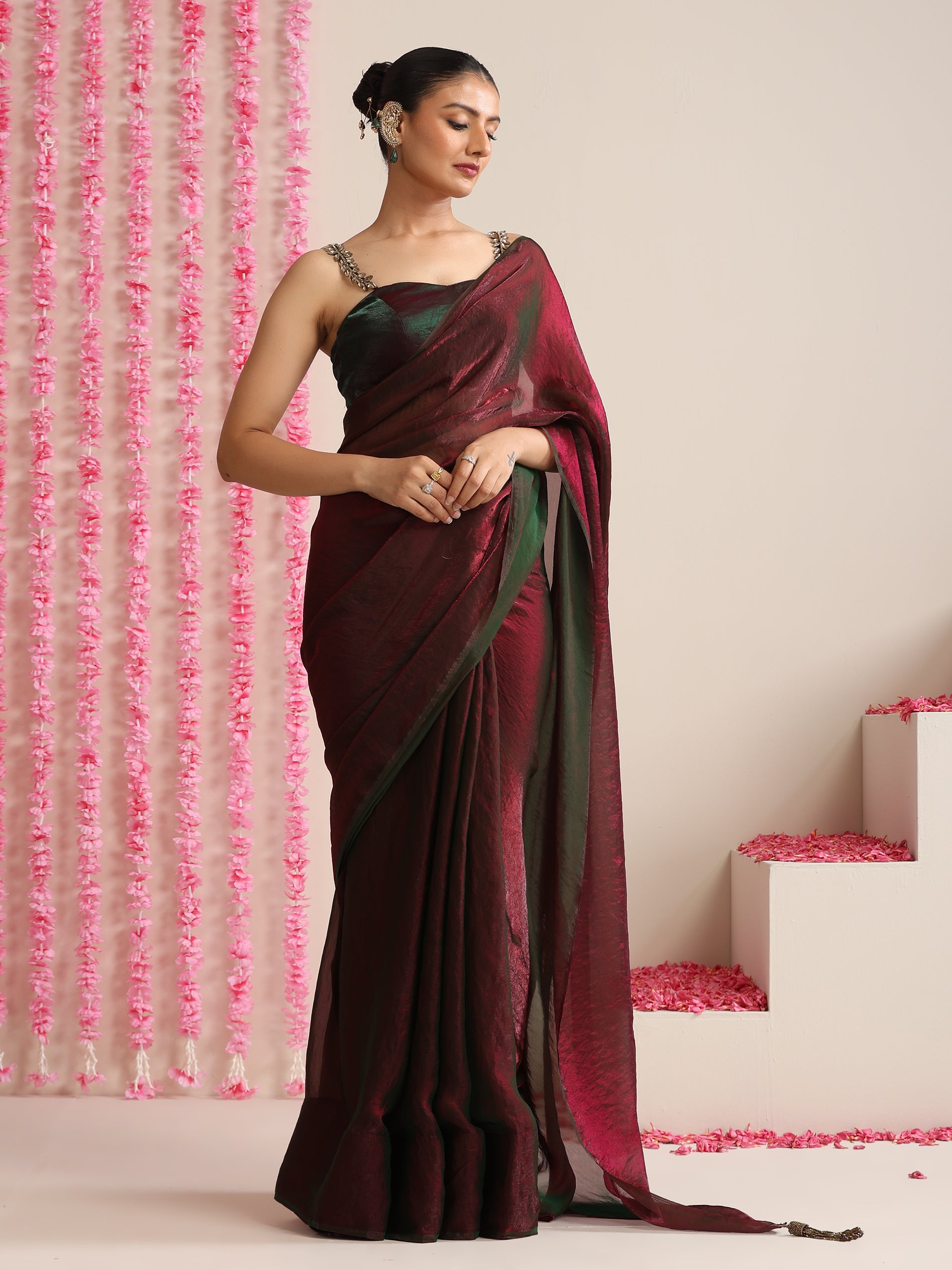 Enigmatic Elegance Saree – Dual-Shade Maroon-Green Metallic Satin with Pendants & Self Blouse Fabric
