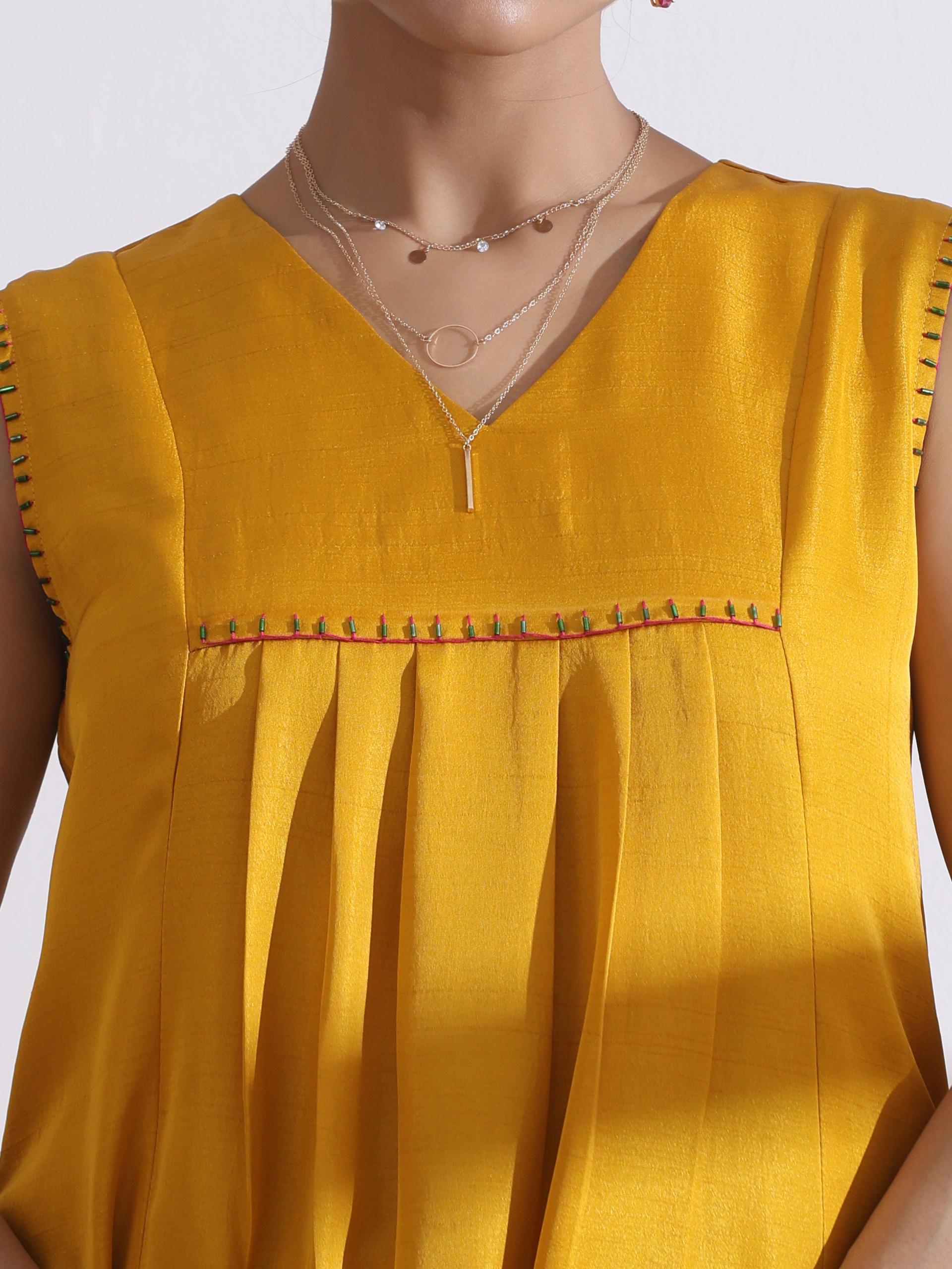 Women's Mustard Sleeveless Kurta with Beads and Green Airskin Pants 2 Piece Set | Straight Fit, V Neck, Sleeveless, Work Wear, (Lux Fabric)