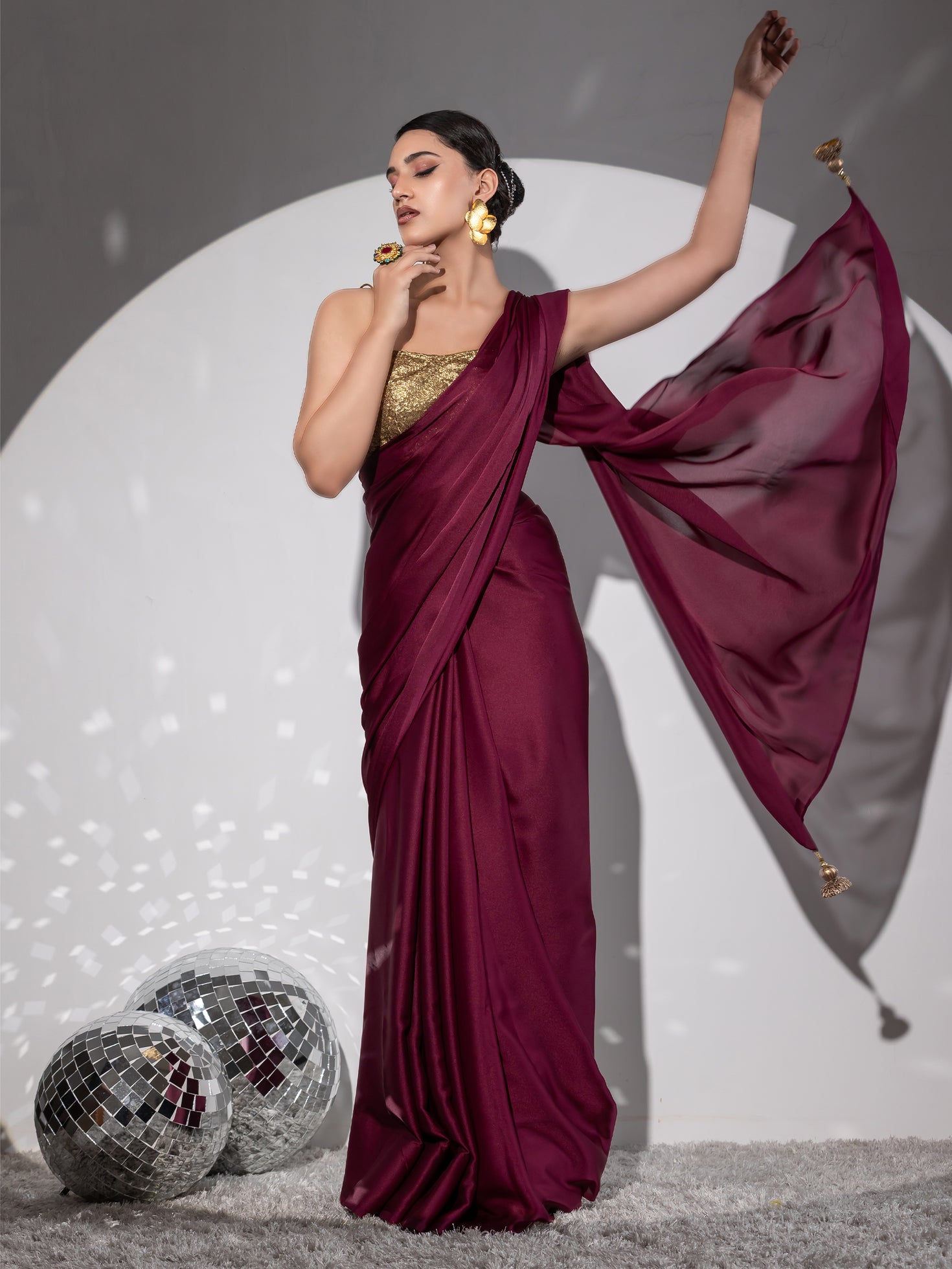Rich Emerald Green Satin Saree with Bronze Pendants