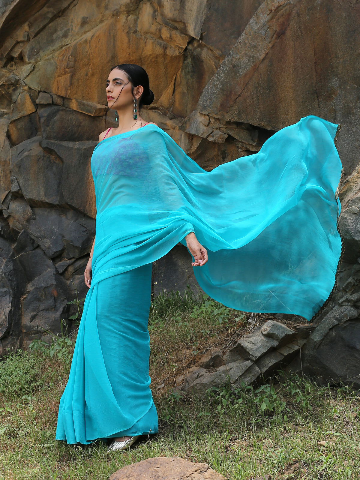 Turquoise chiffon saree with bronze lace