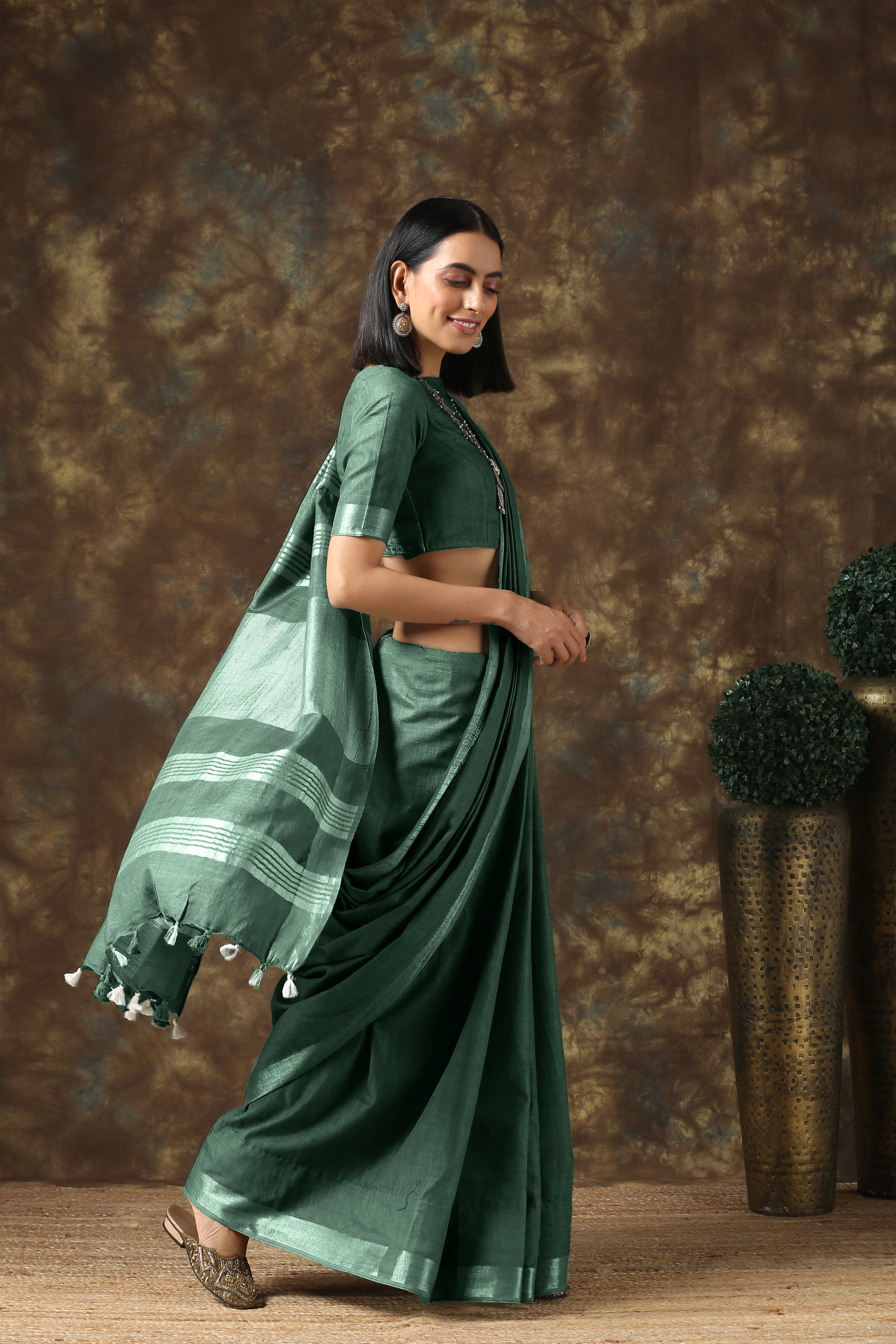 Opulent olive linen saree with silver border and blouse — view 4