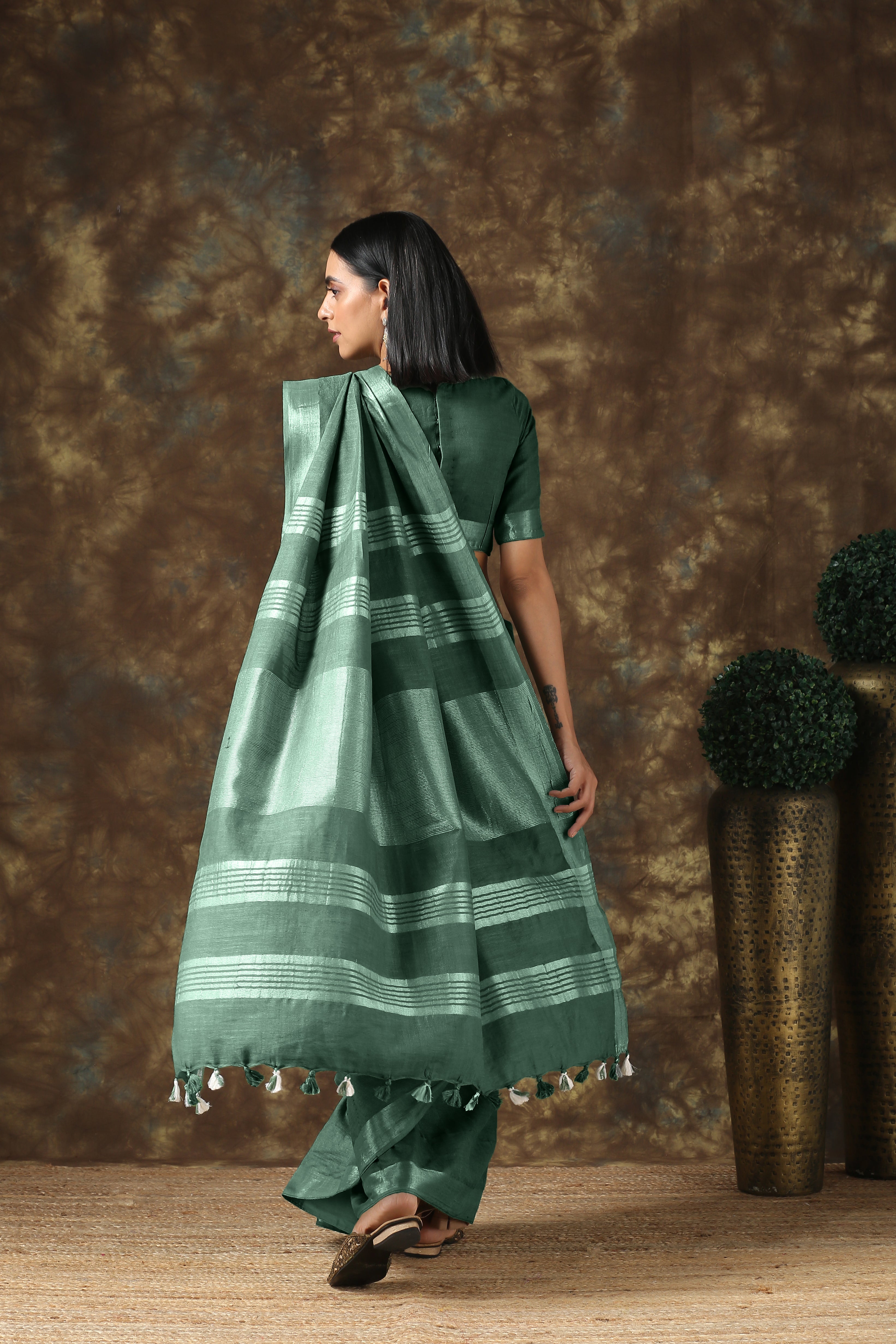 Opulent olive linen saree with silver border and blouse — view 2