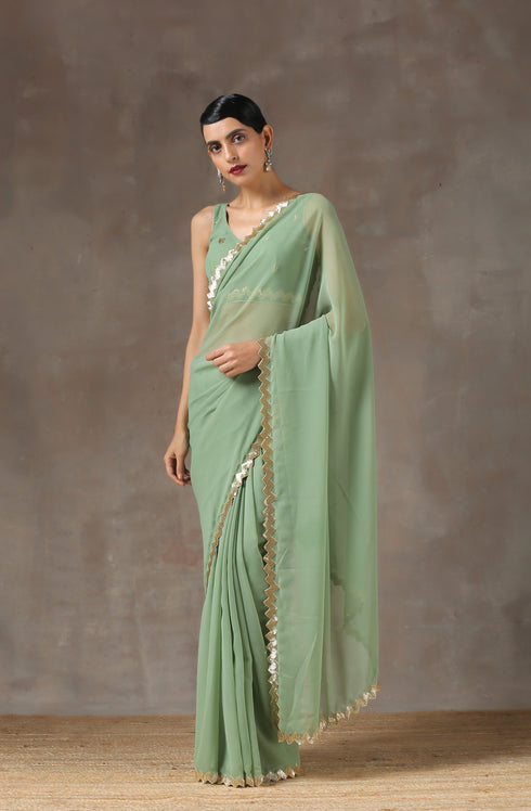 Sparking Henna Saree with Gold Sequins & Embellished Blouse