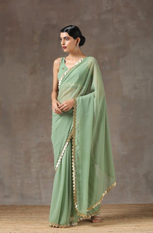 Sparking Henna Saree with Gold Sequins & Embellished Blouse