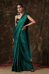 Rich Emerald Green Satin Saree with Bronze Pendants