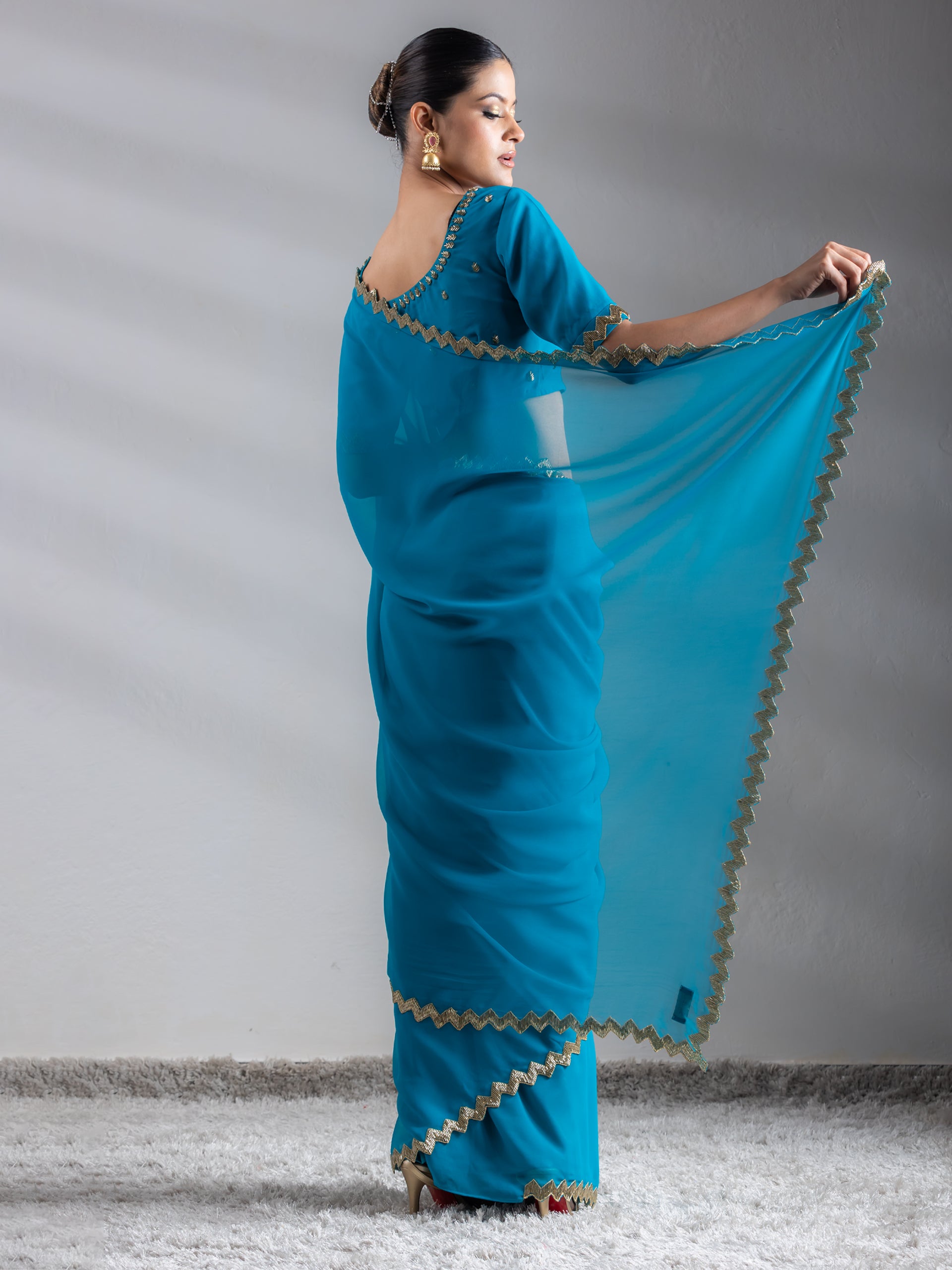 Turquoise Sequin Georgette Saree with Blouse Fabric