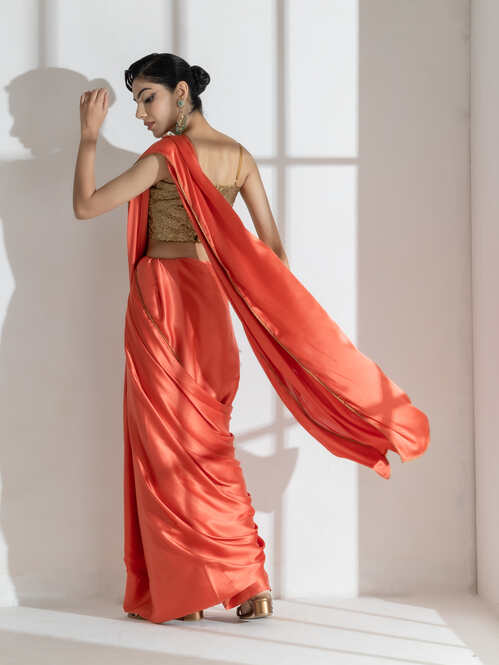 Spanish Orange Satin Saree with Golden Piping and Self Blouse Fabric