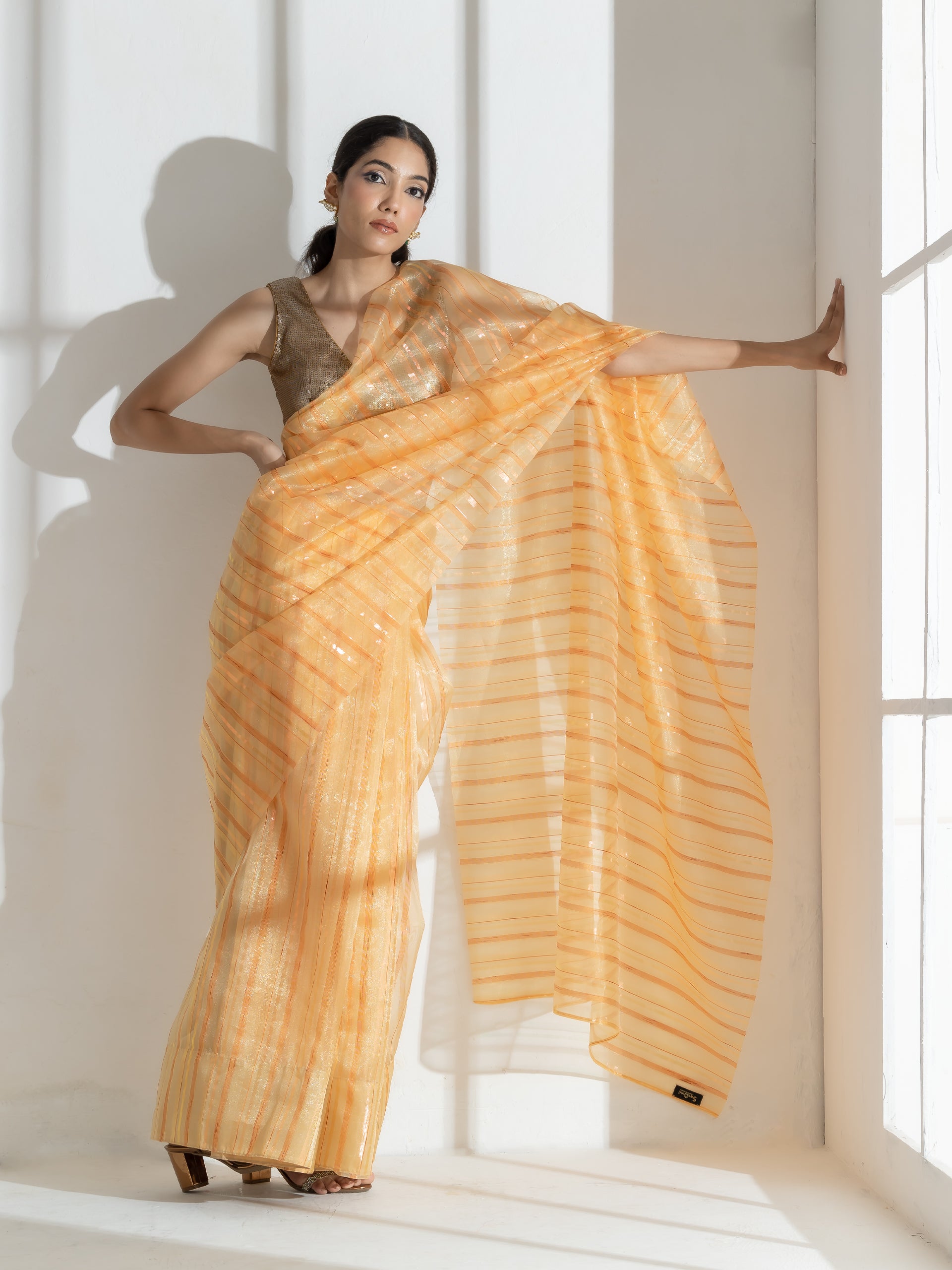 Sun Glow Yellow Organza Saree with Rosegold Stripes