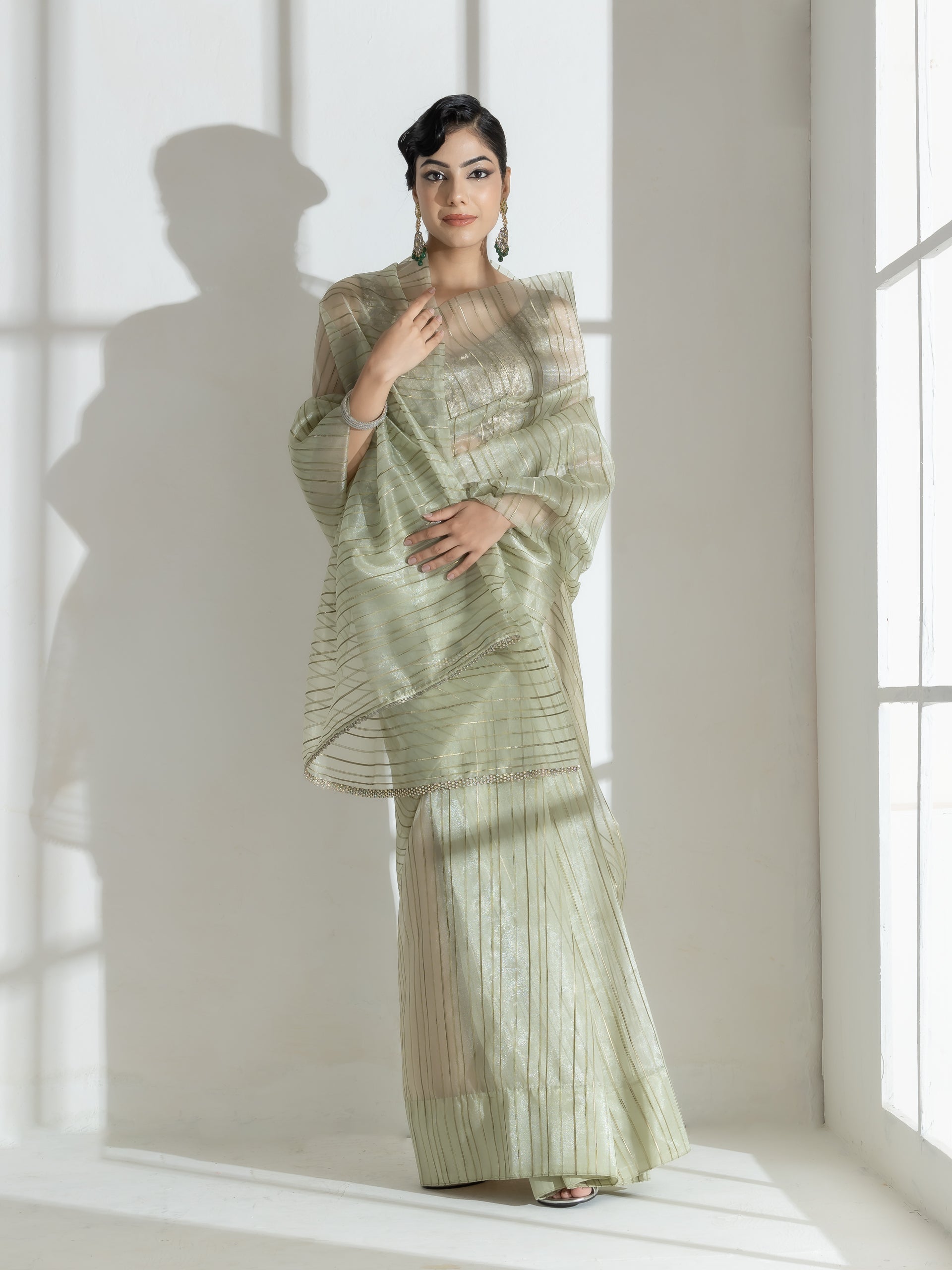 Summer Green Organza Saree with Self Stripes and Rainbow Lace