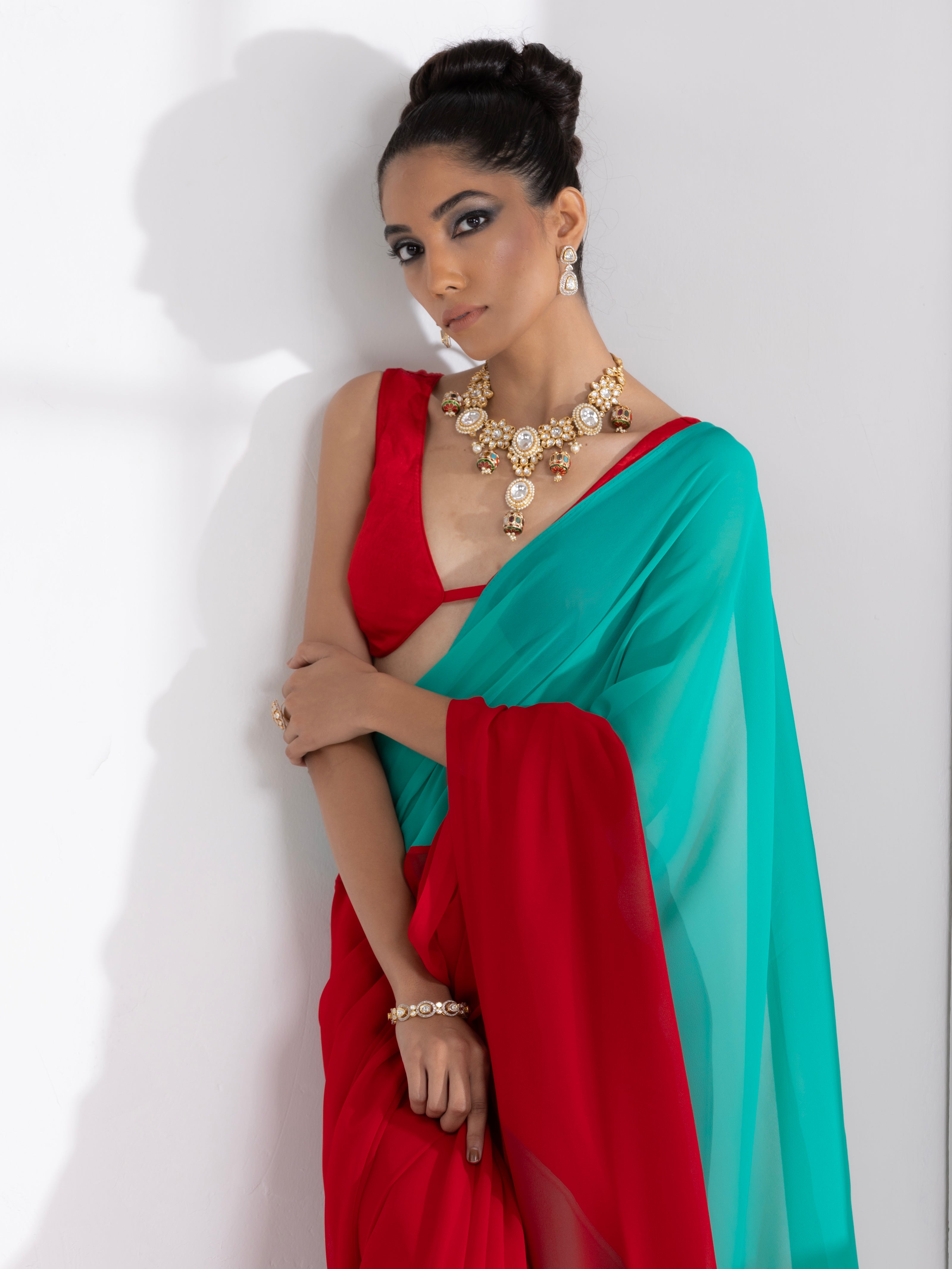 Red and Carribean Triangle Georgette Saree with Red Posh Blouse Fabric