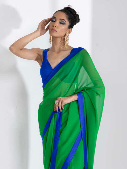 Tree Green Georgette Saree with Blue Posh Fabric Border & Blouse Fabric