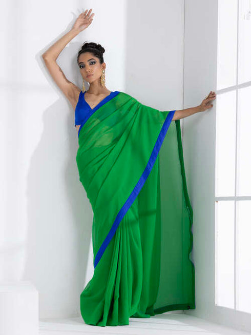 Tree Green Georgette Saree with Blue Posh Fabric Border & Blouse Fabric