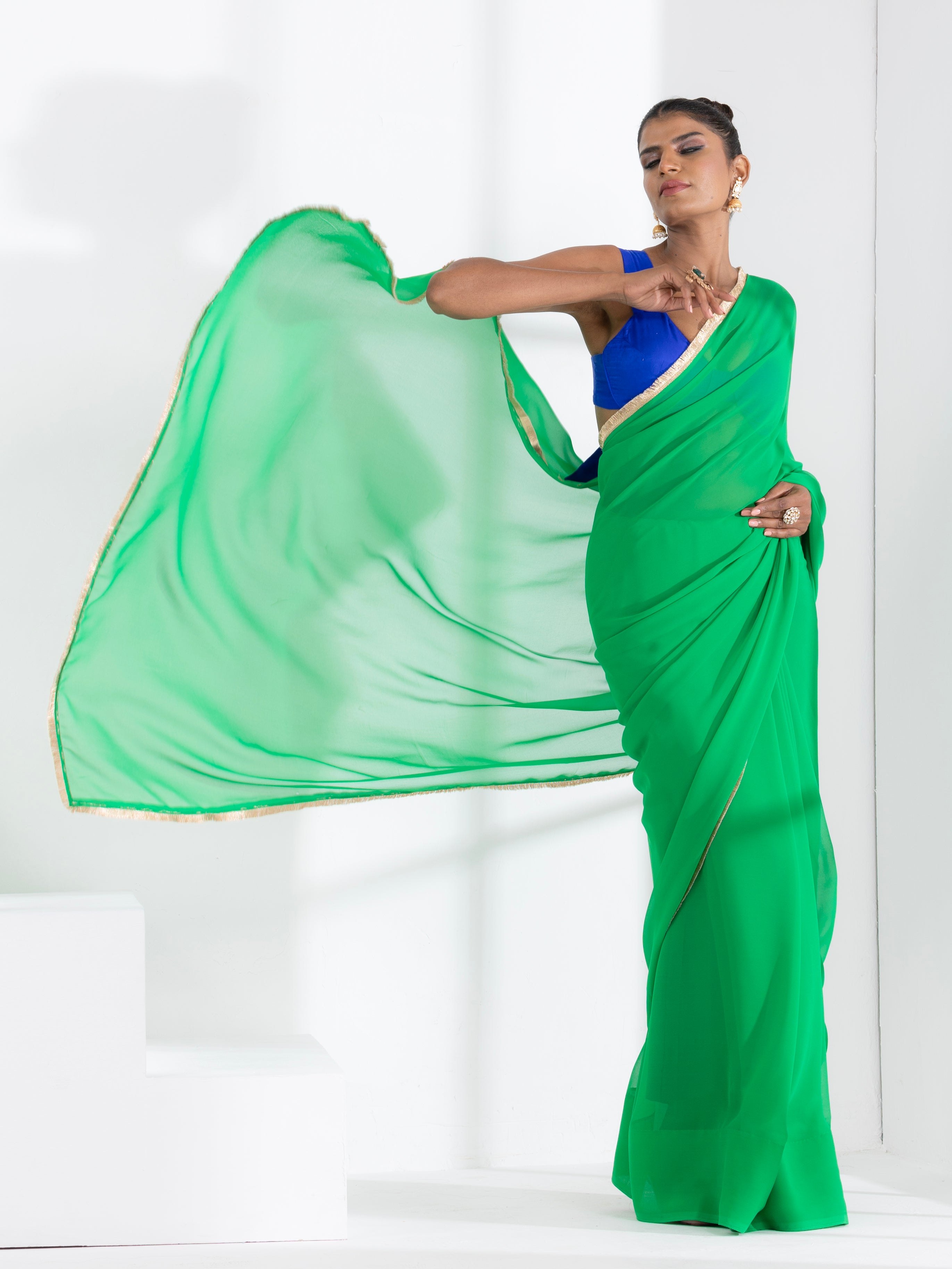 Irish Green Georgette Saree with Lace and Blue Posh Blouse Fabric