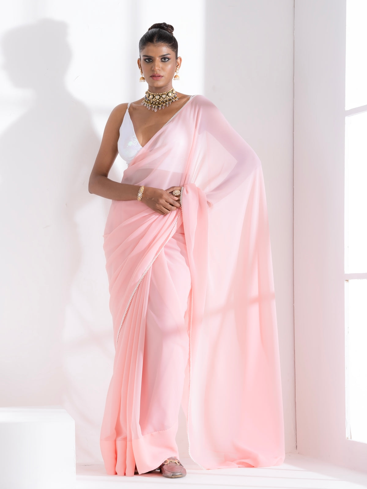 Pink salmon georgette saree with lace and iridescent sequin blouse fabric