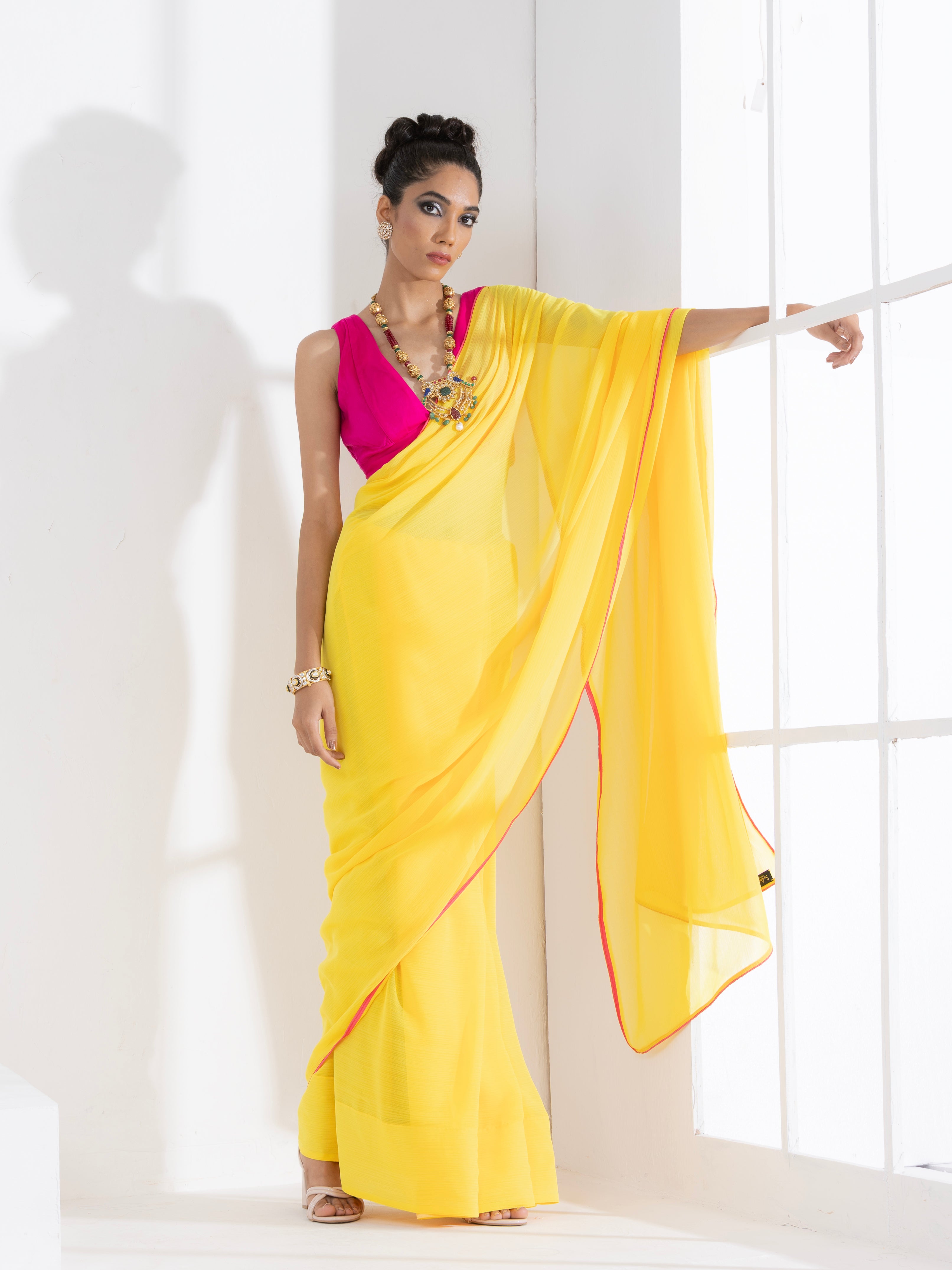 Corn Yellow Textured Chiffon Saree with Pink Piping and Fuchsia Blouse Fabric
